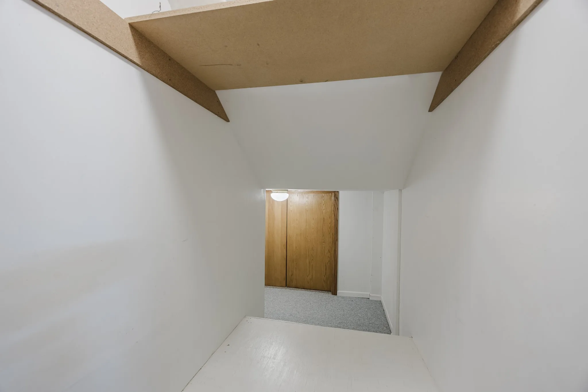 Under the stairs storage.