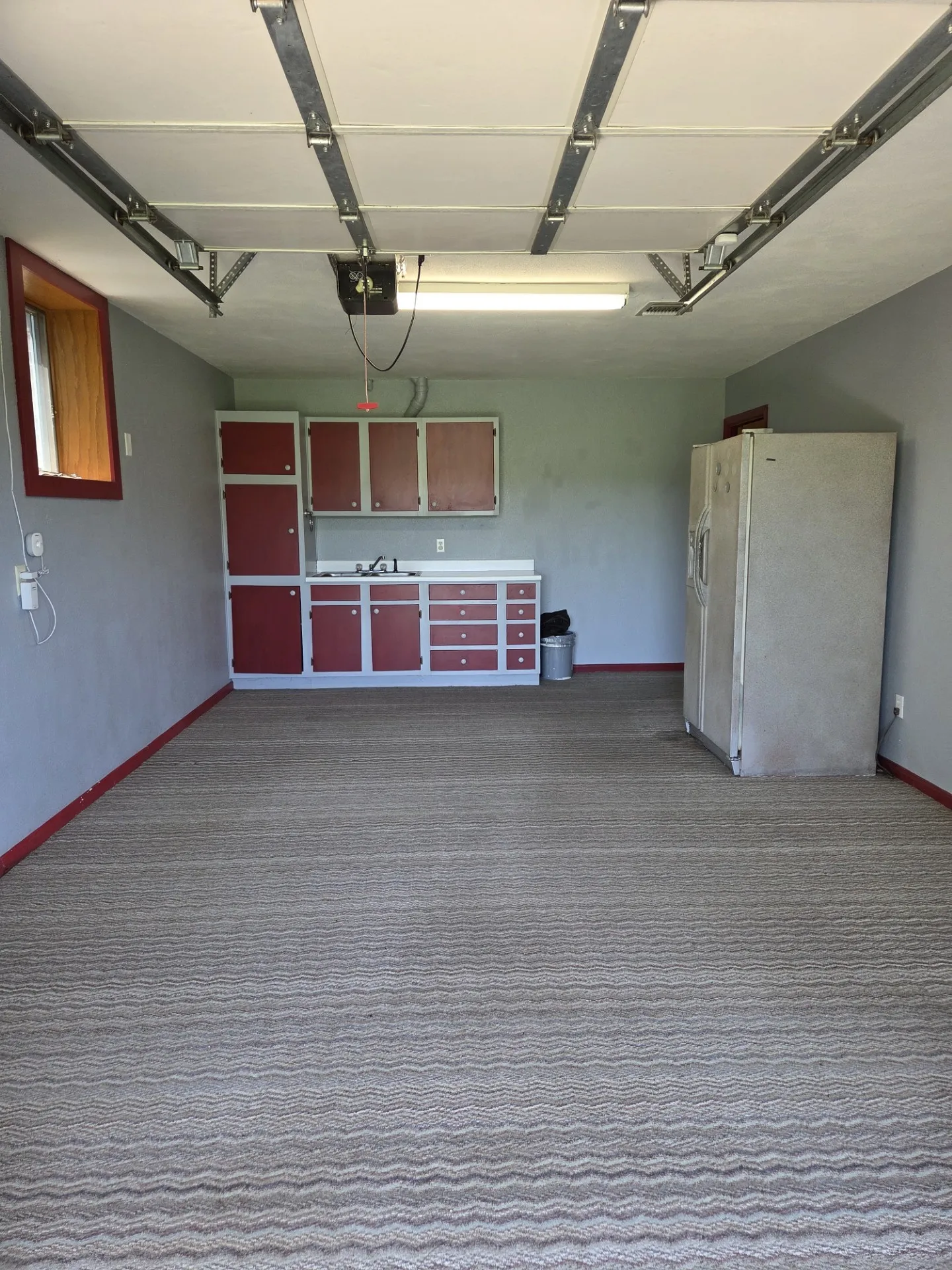 Golf cart garage and workshop located on the rear of the home.