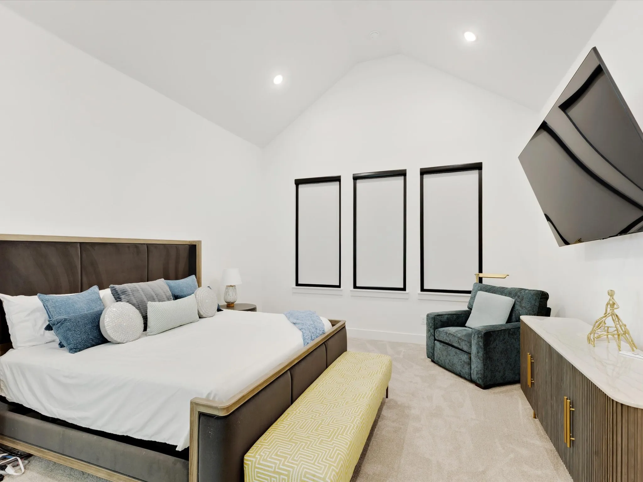  Primary Bedroom featuring light colored carpet and recessed lighting