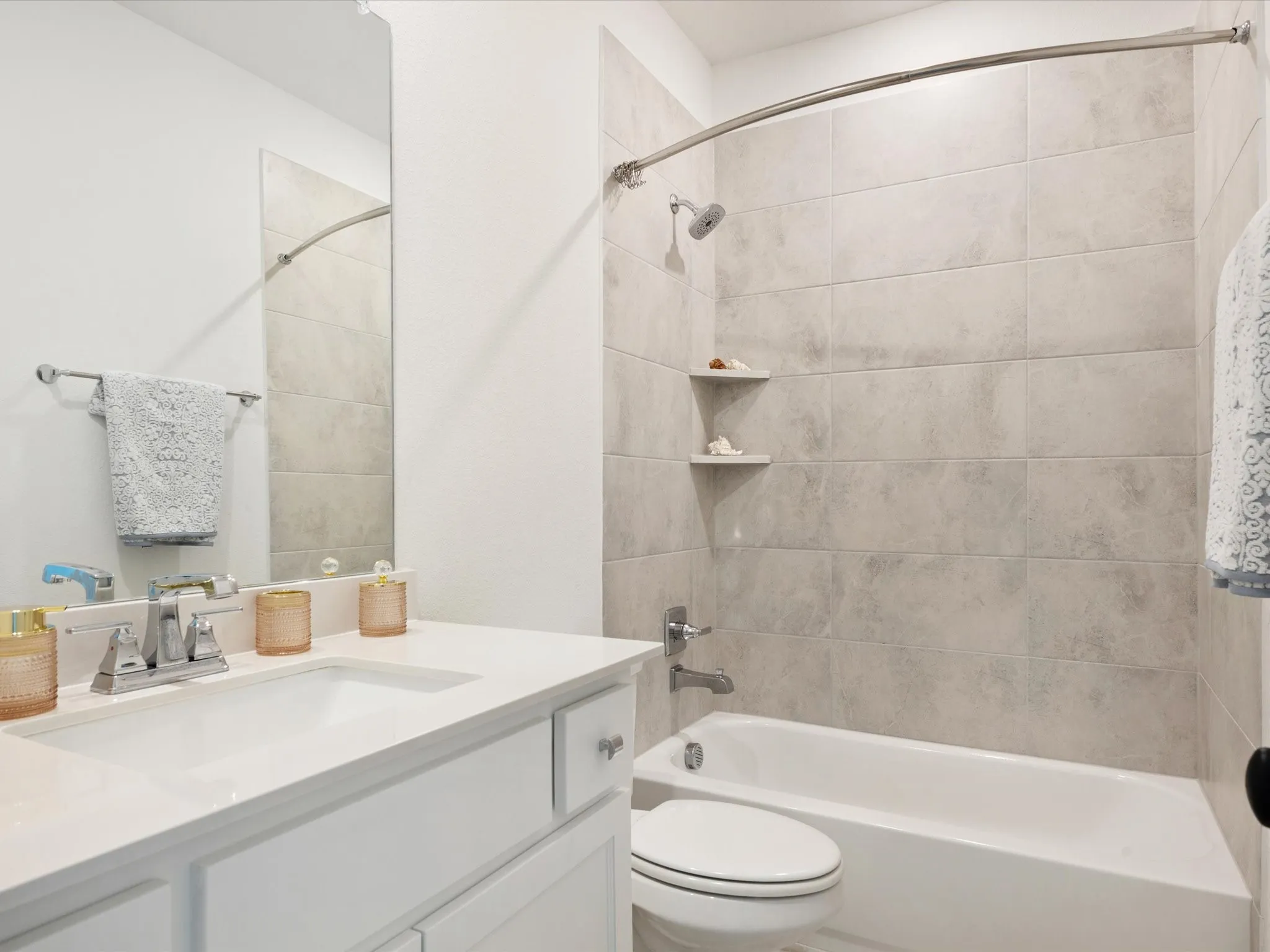 Bathroom 4 featuring vanity and  shower combination