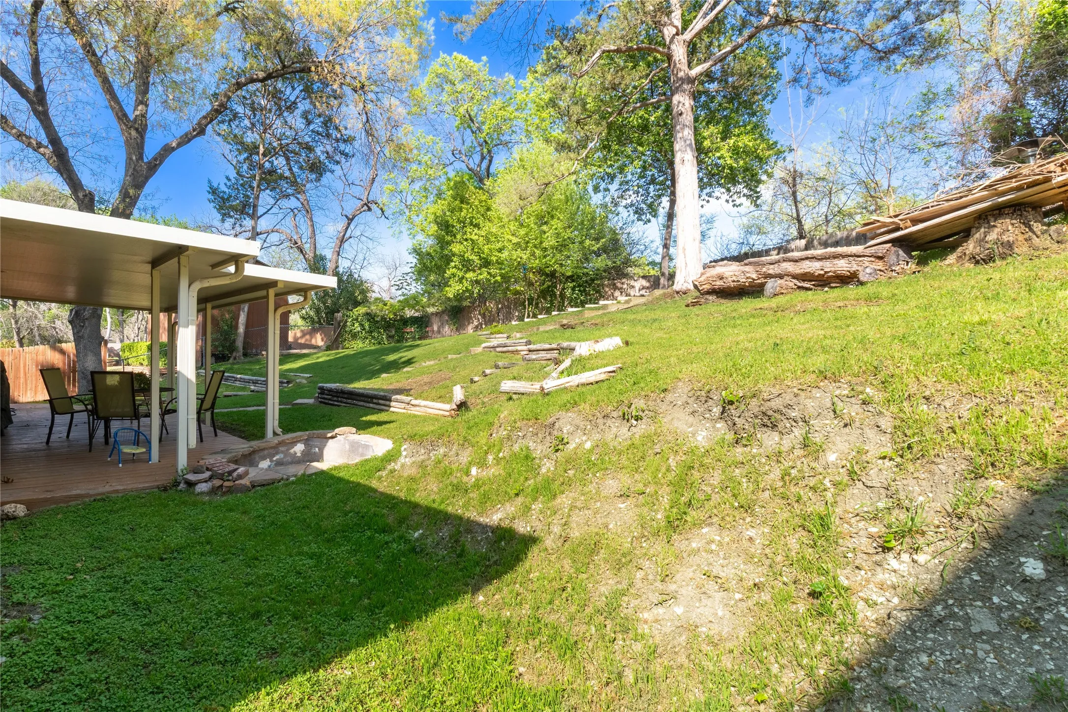 View of yard with a wooden deck