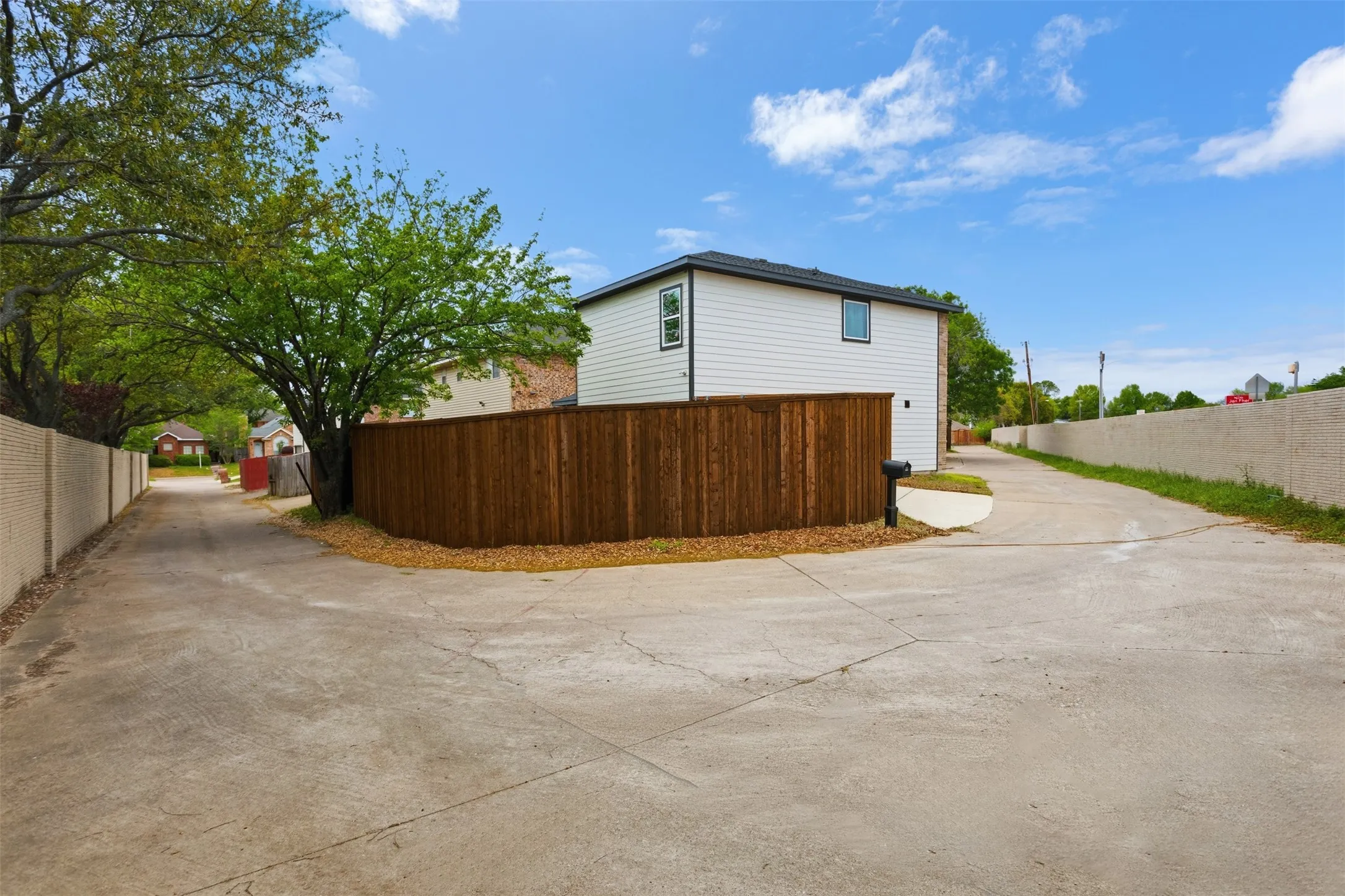 View of property exterior with driveway