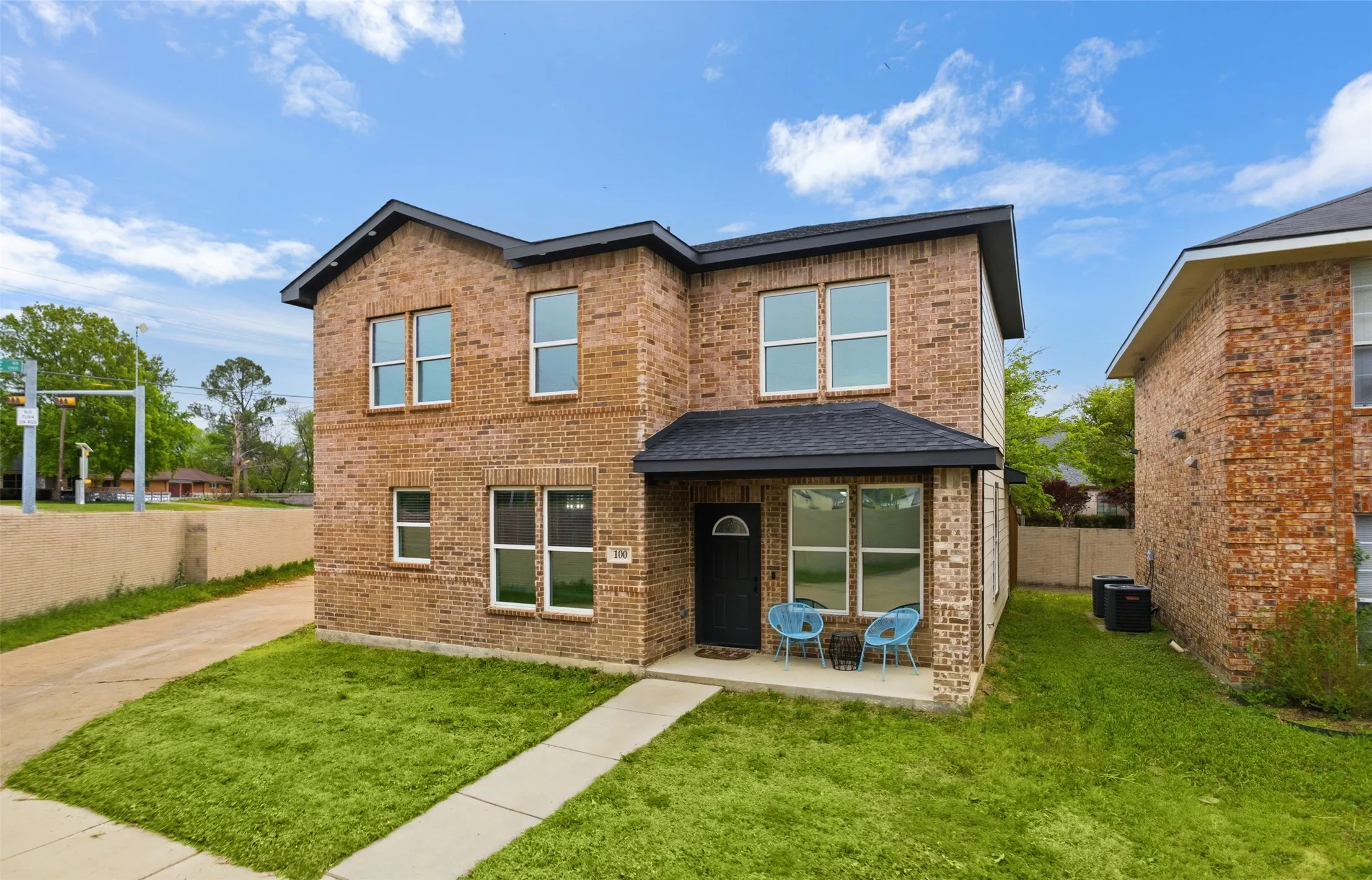 Traditional home with brick siding