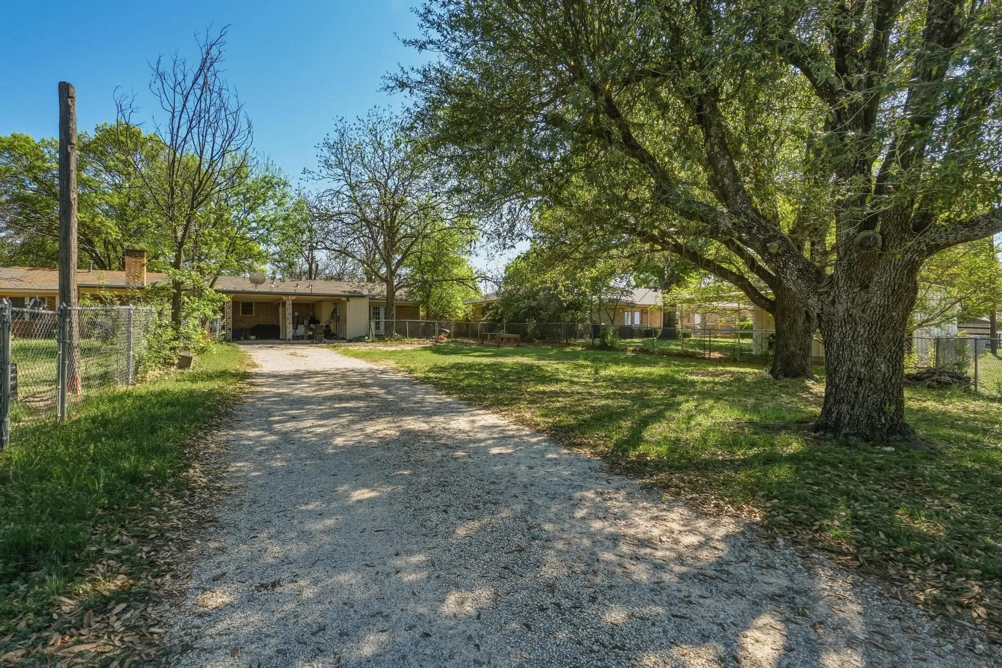 Driveway leading to carport