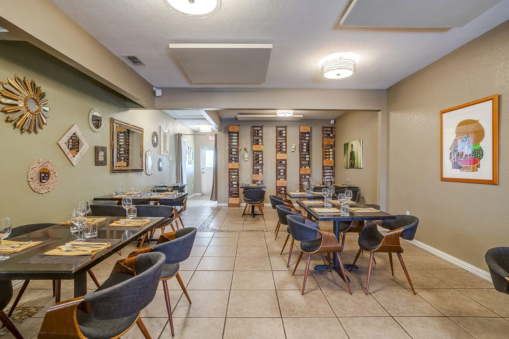 The oversized tile flooring adds to the open space concept.