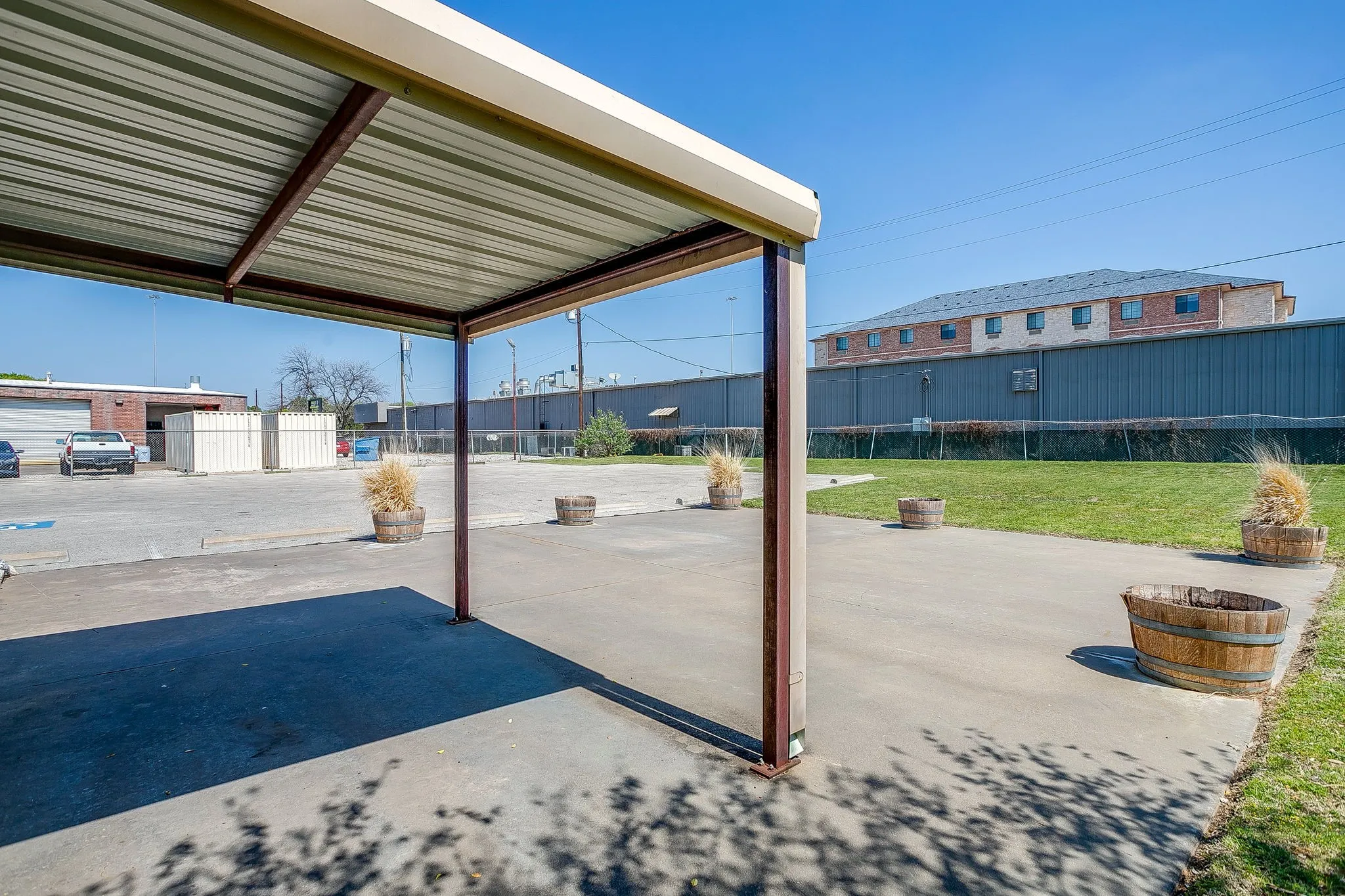 An extended covered back area with an extended patio. Imagine this being an excellent outdoor dining experience. Plus, the sun sets opposite of this area which is ideal.