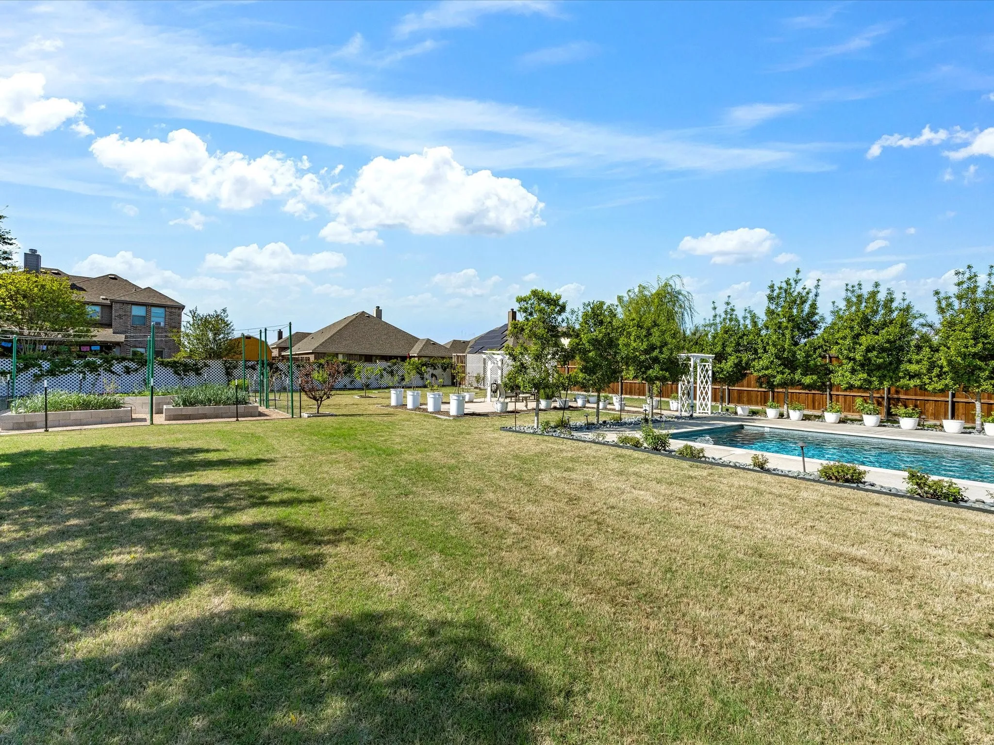 View of community with a pool and a patio area