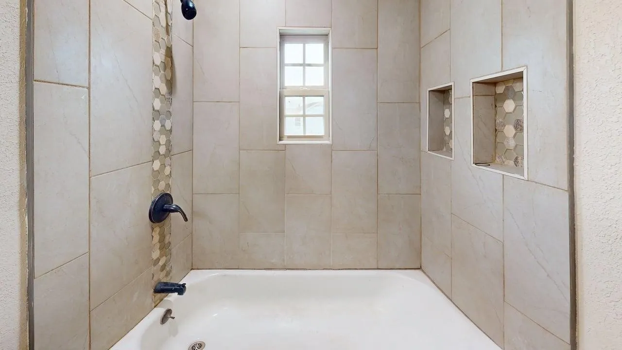 Full bath with bathtub / shower combination