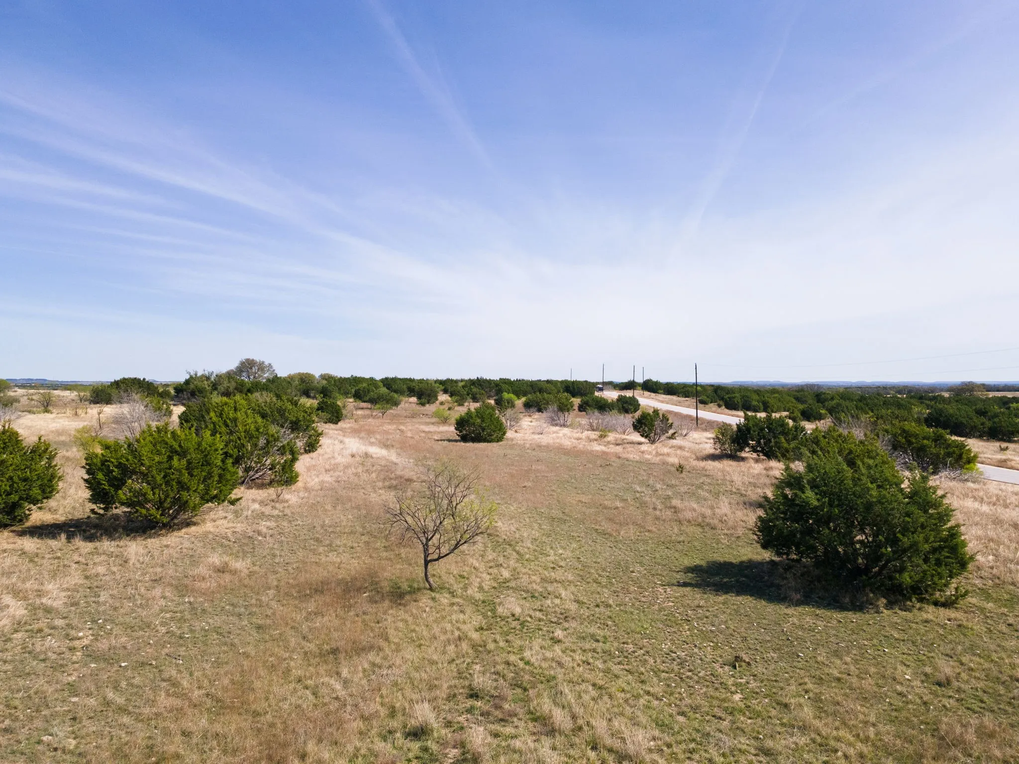 View of green lawn featuring a view of rural / pastoral area