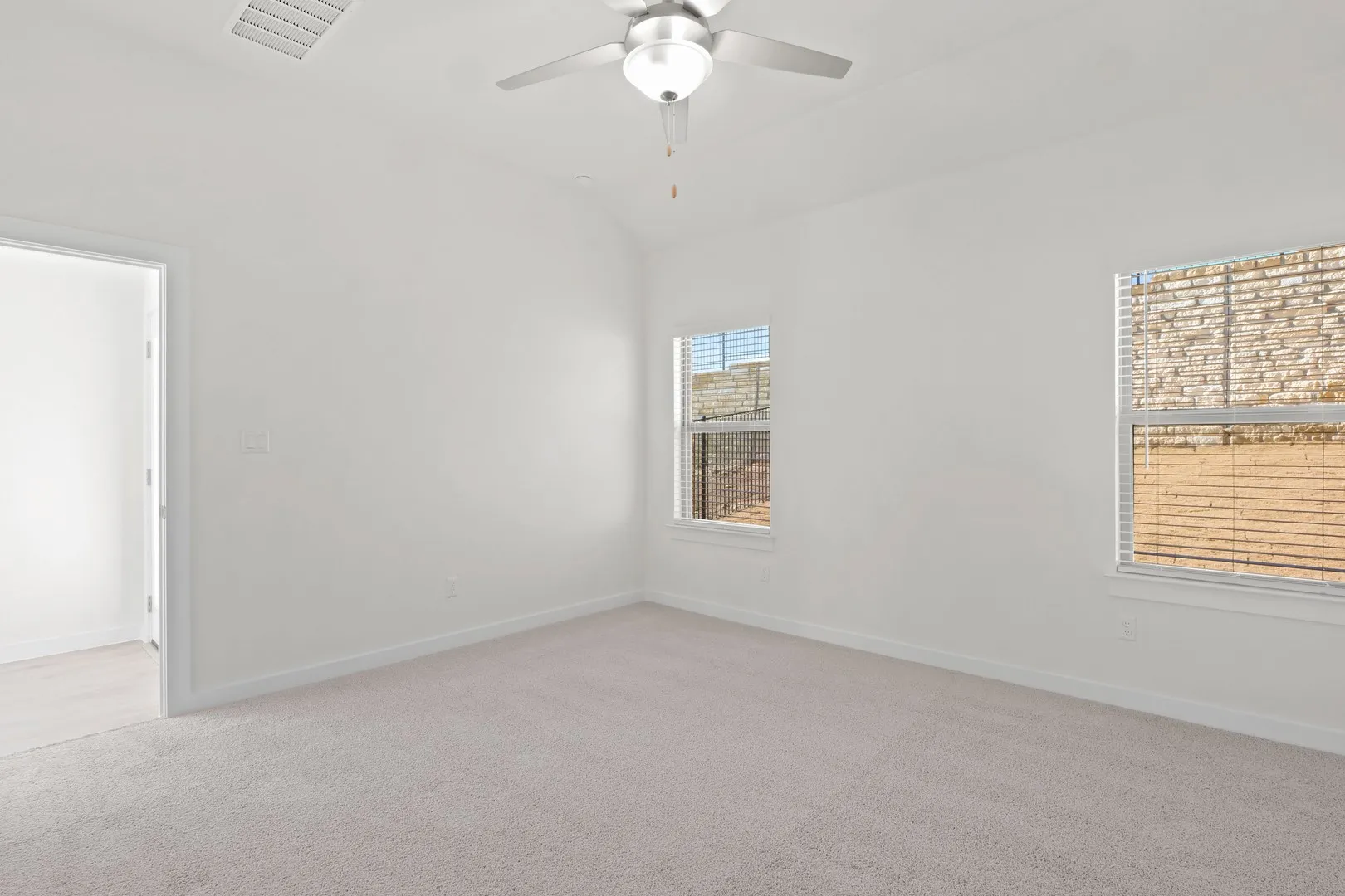 Primary Bedroom in the Pecan II home plan by Trophy Signature Homes – REPRESENTATIVE PHOTO