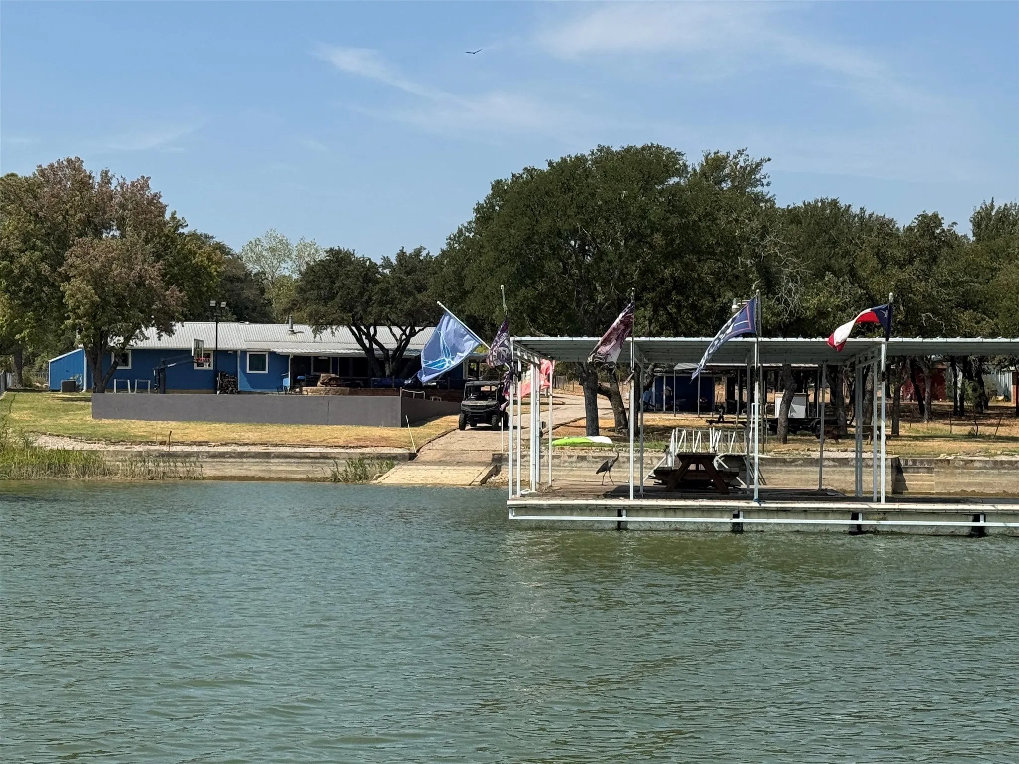 View of private dock, primary house and guest house
