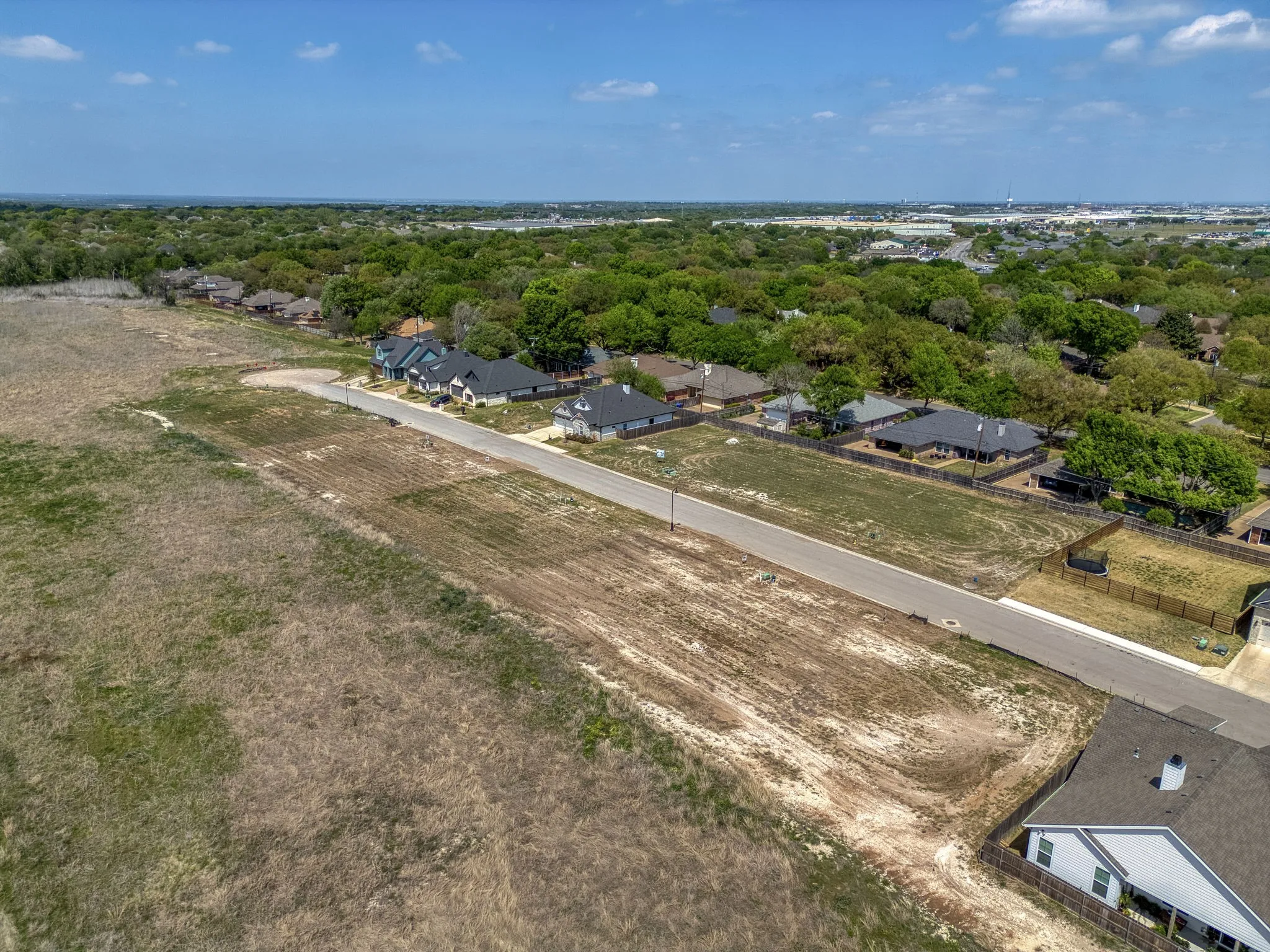 View of property location featuring nearby suburban area