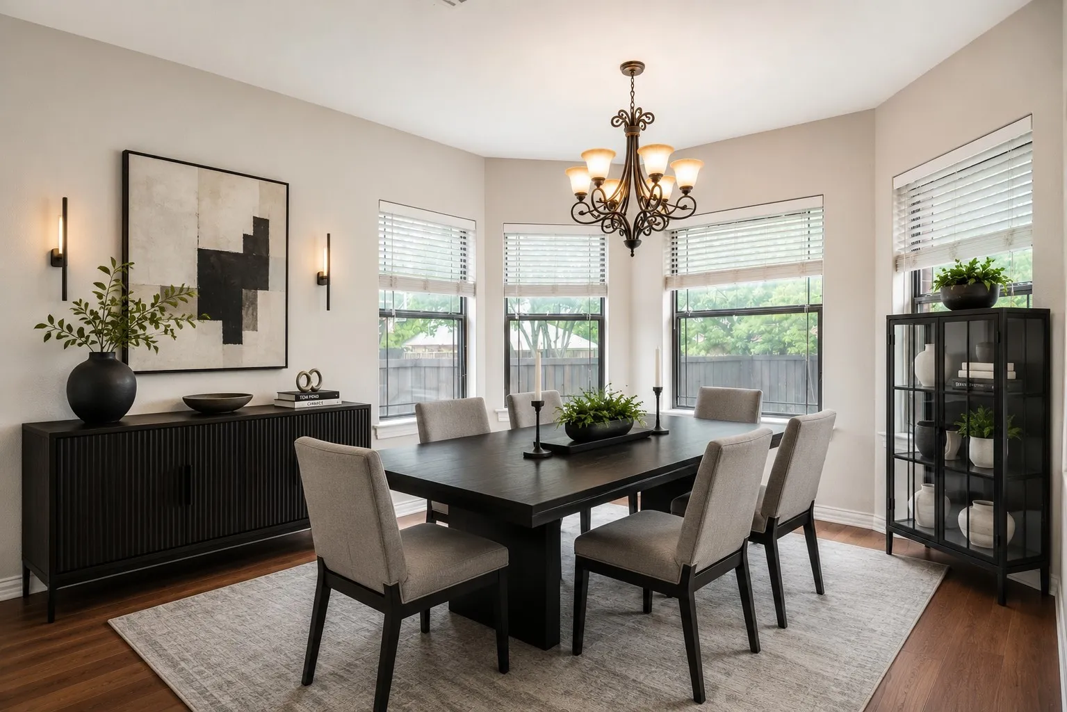Virtual Staging dining space featuring wood-finish flooring and a central area rug