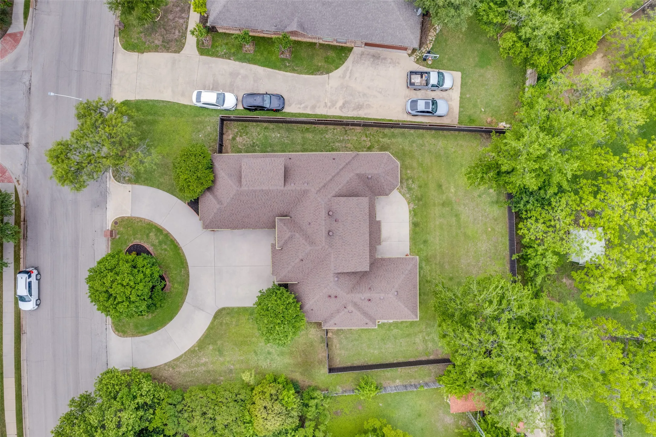 Property featuring a multi-gabled roofline and an expansive lot