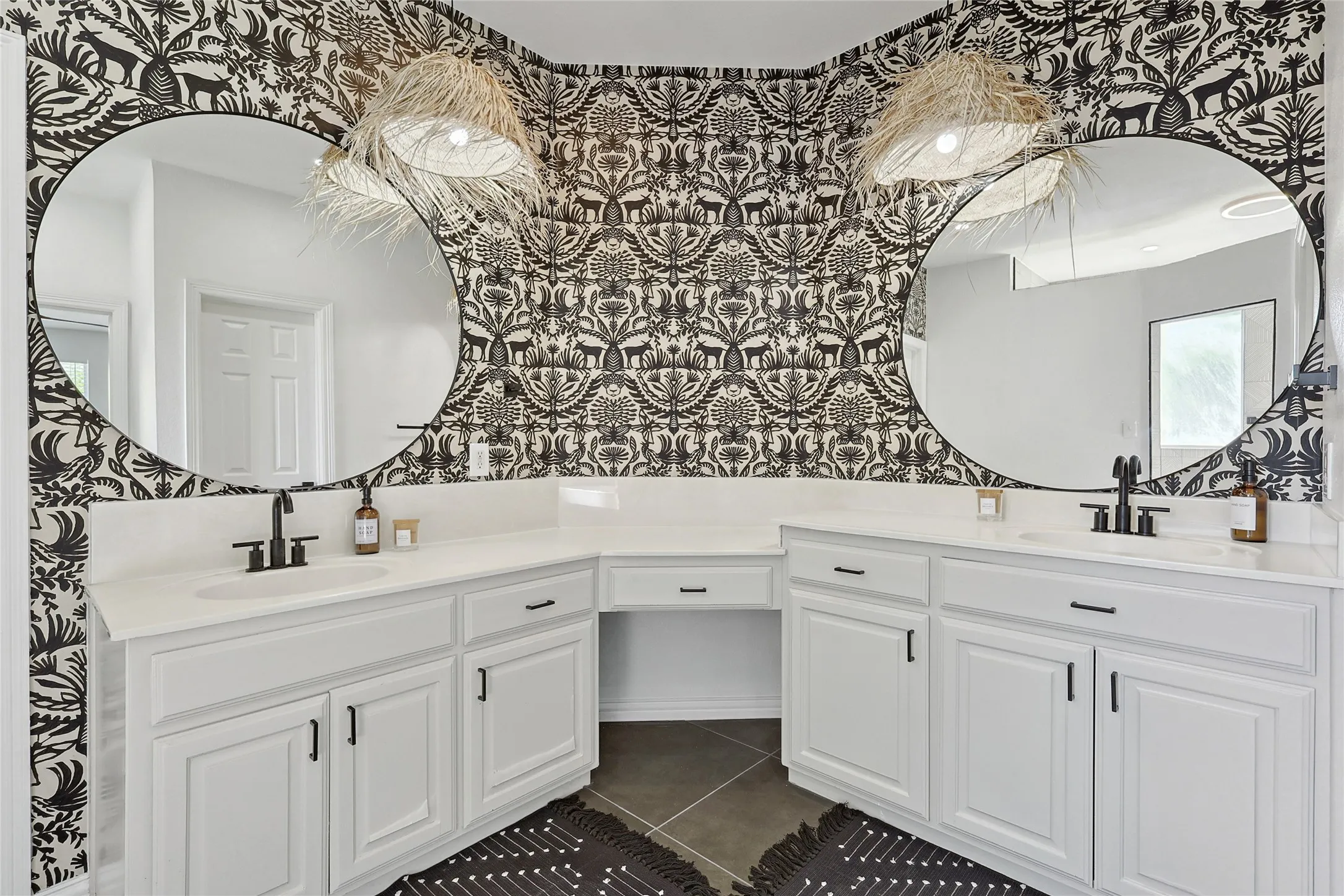 Bathroom with tile flooring and vanity