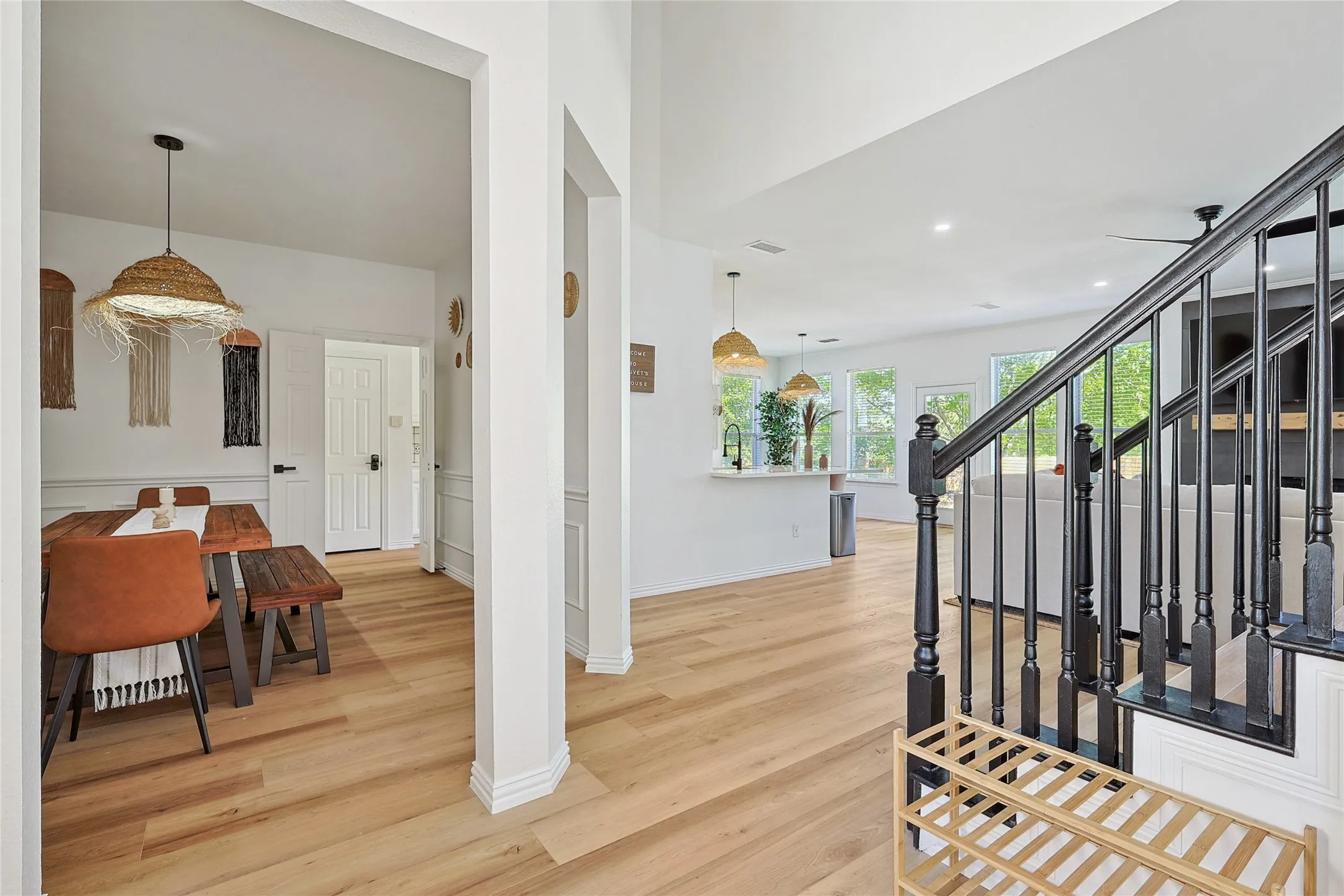 Foyer with light hardwood / wood-style flooring