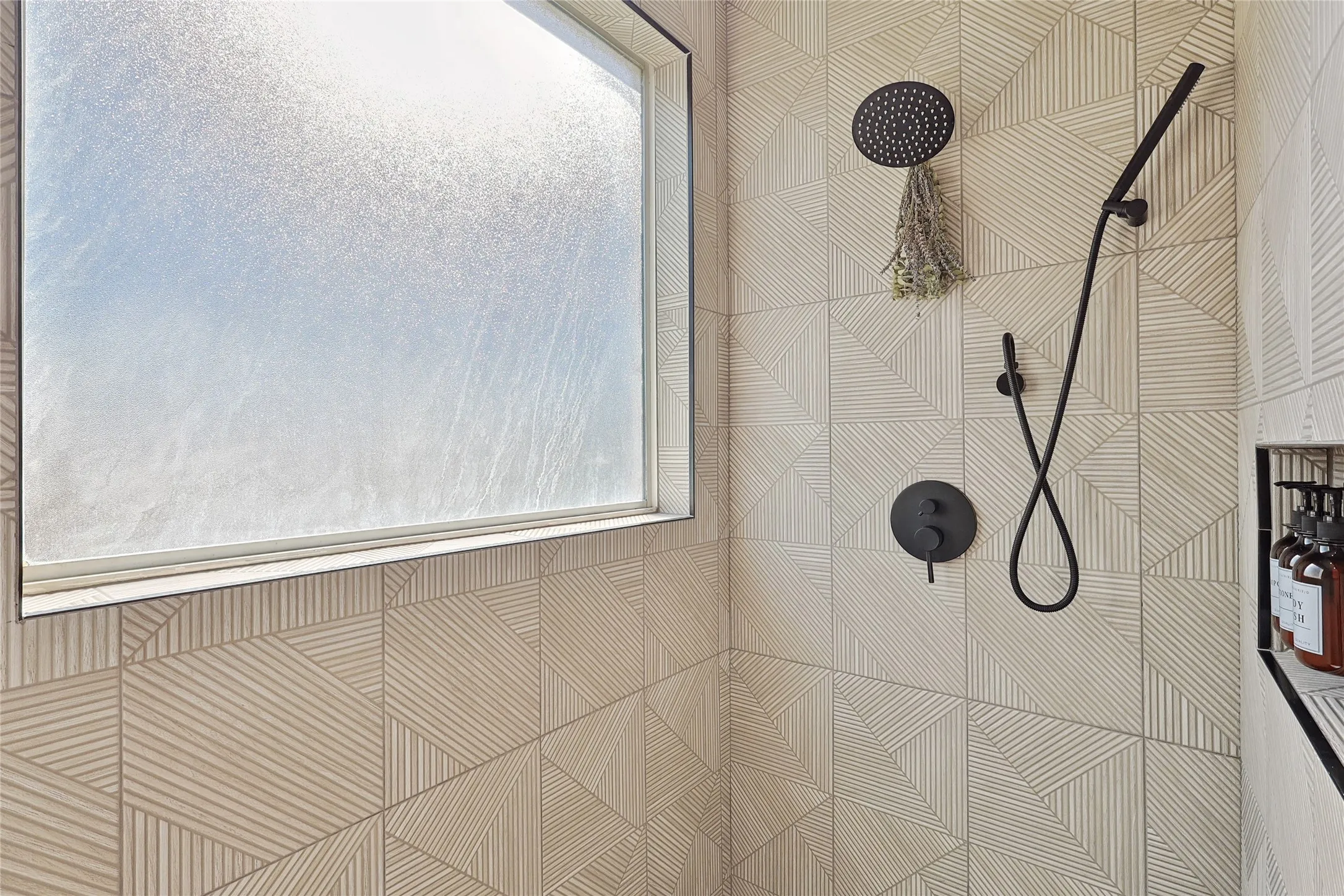Interior details featuring tiled shower