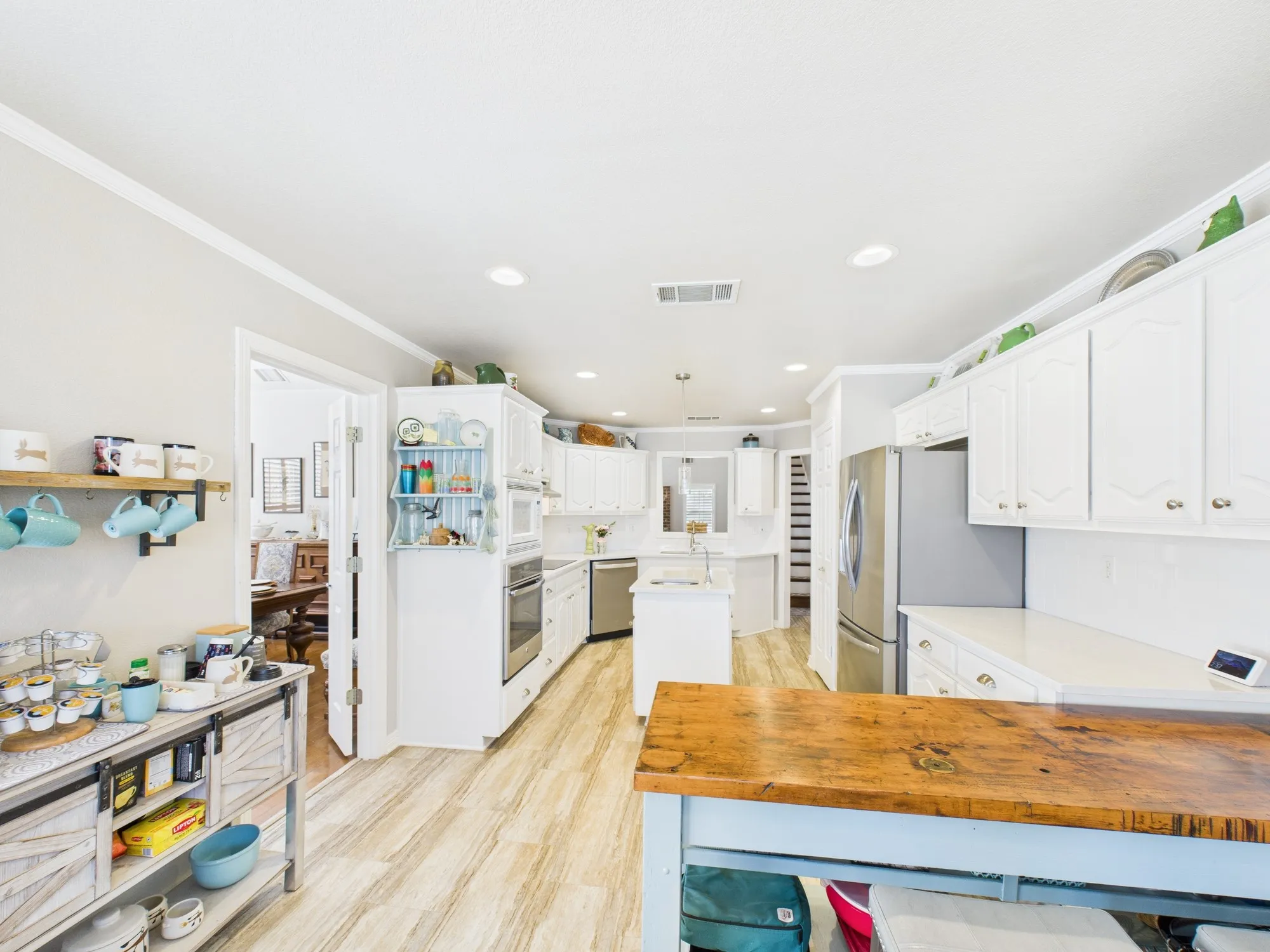 View of kitchen from the breakfast area. Island in kitchen, room for a coffee bar