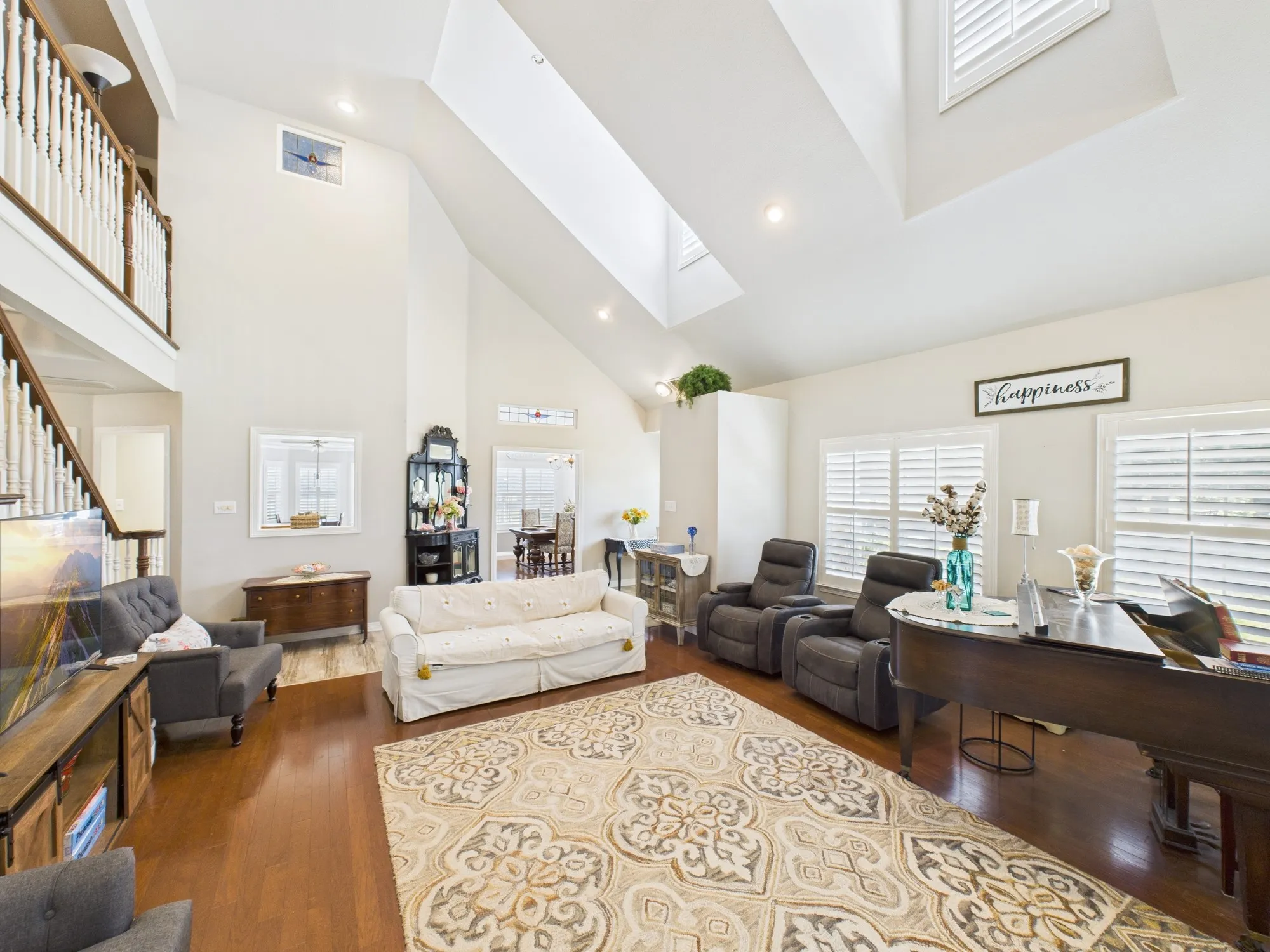 Natural light from the high windows close to the ceiling, wood floors