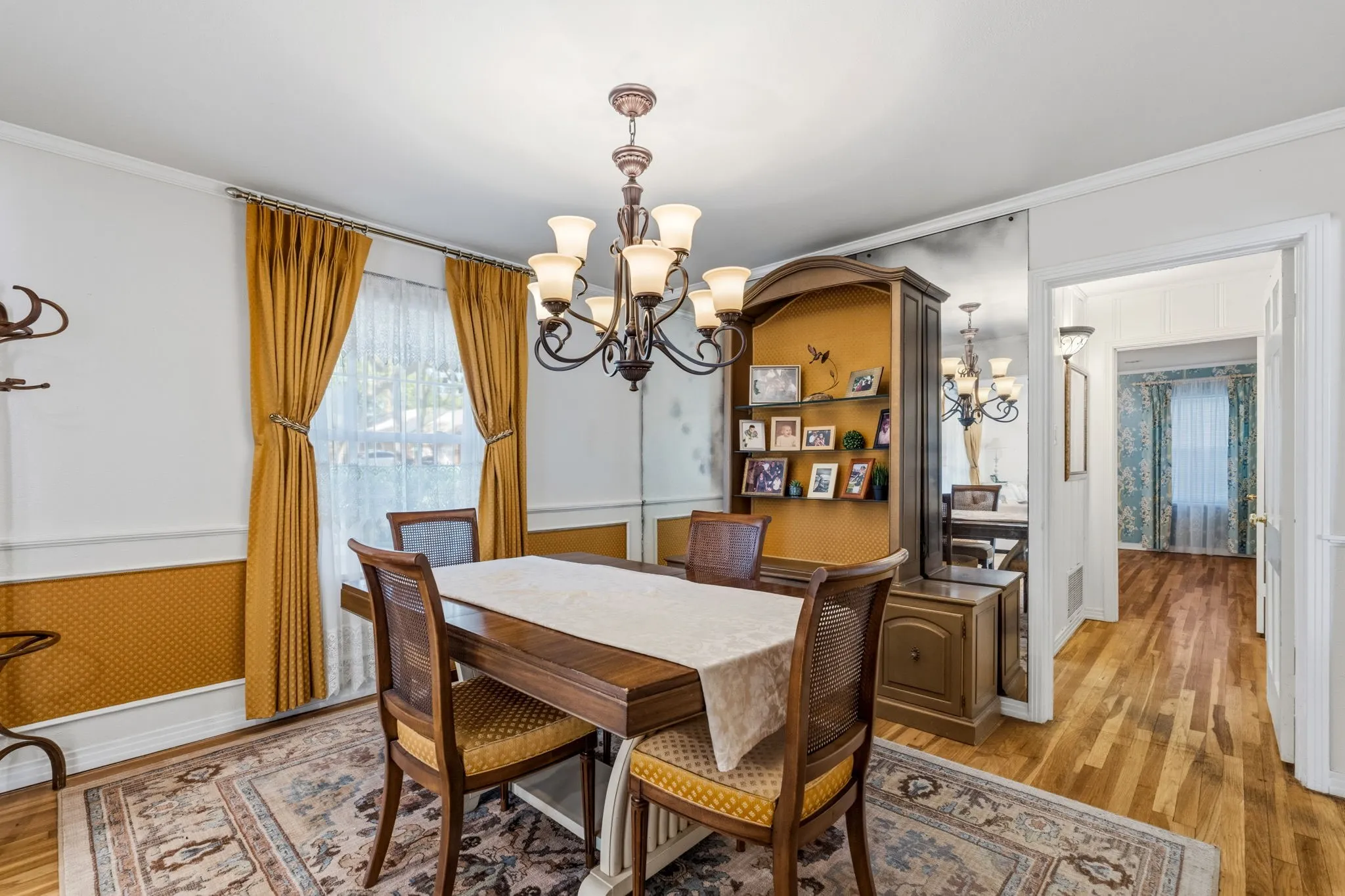 Formal Dining and Hall to Bedroom and Full Bath