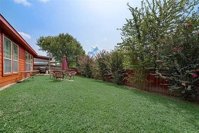 View of fenced backyard