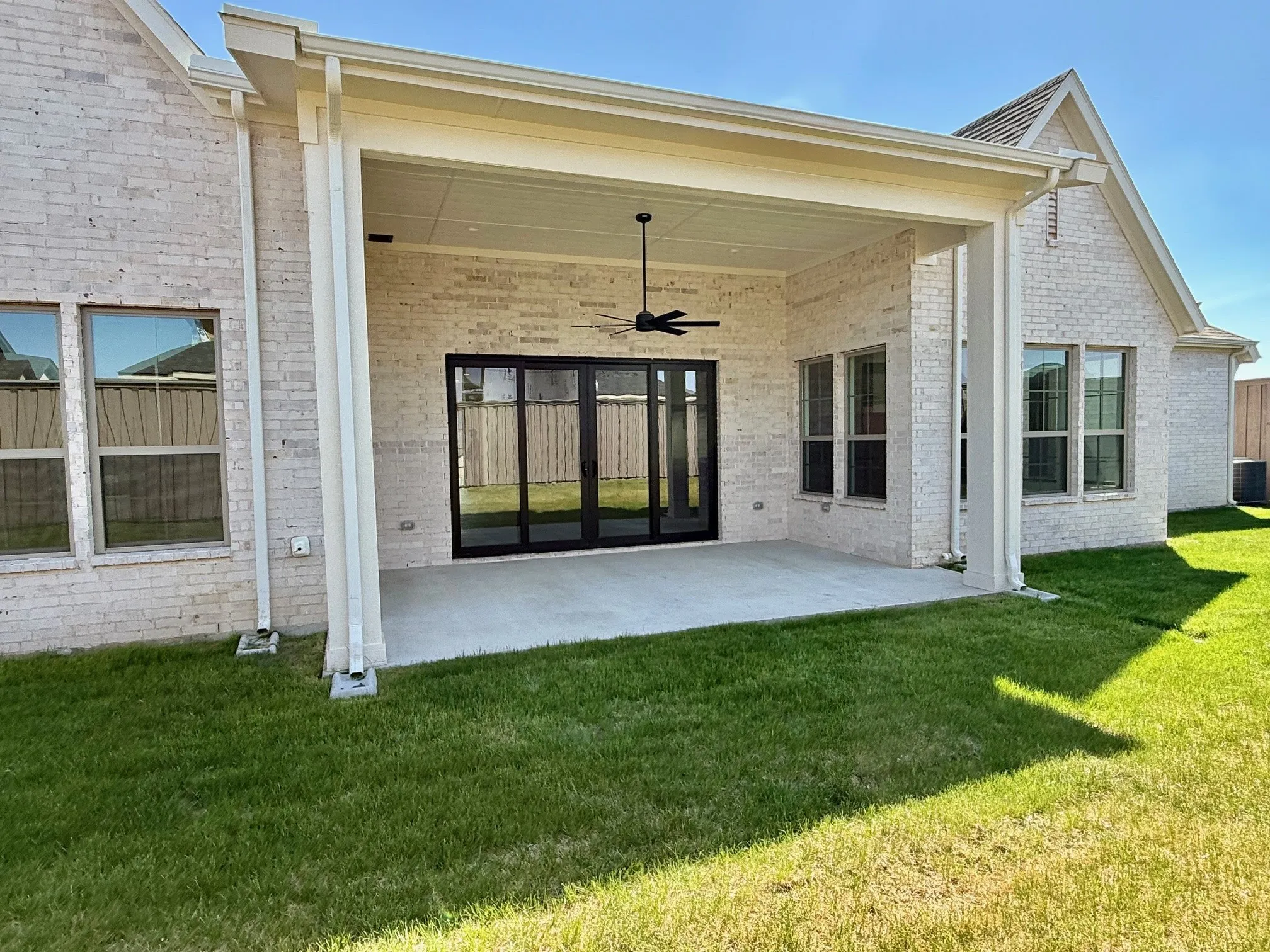 back porch area with large sliding back door