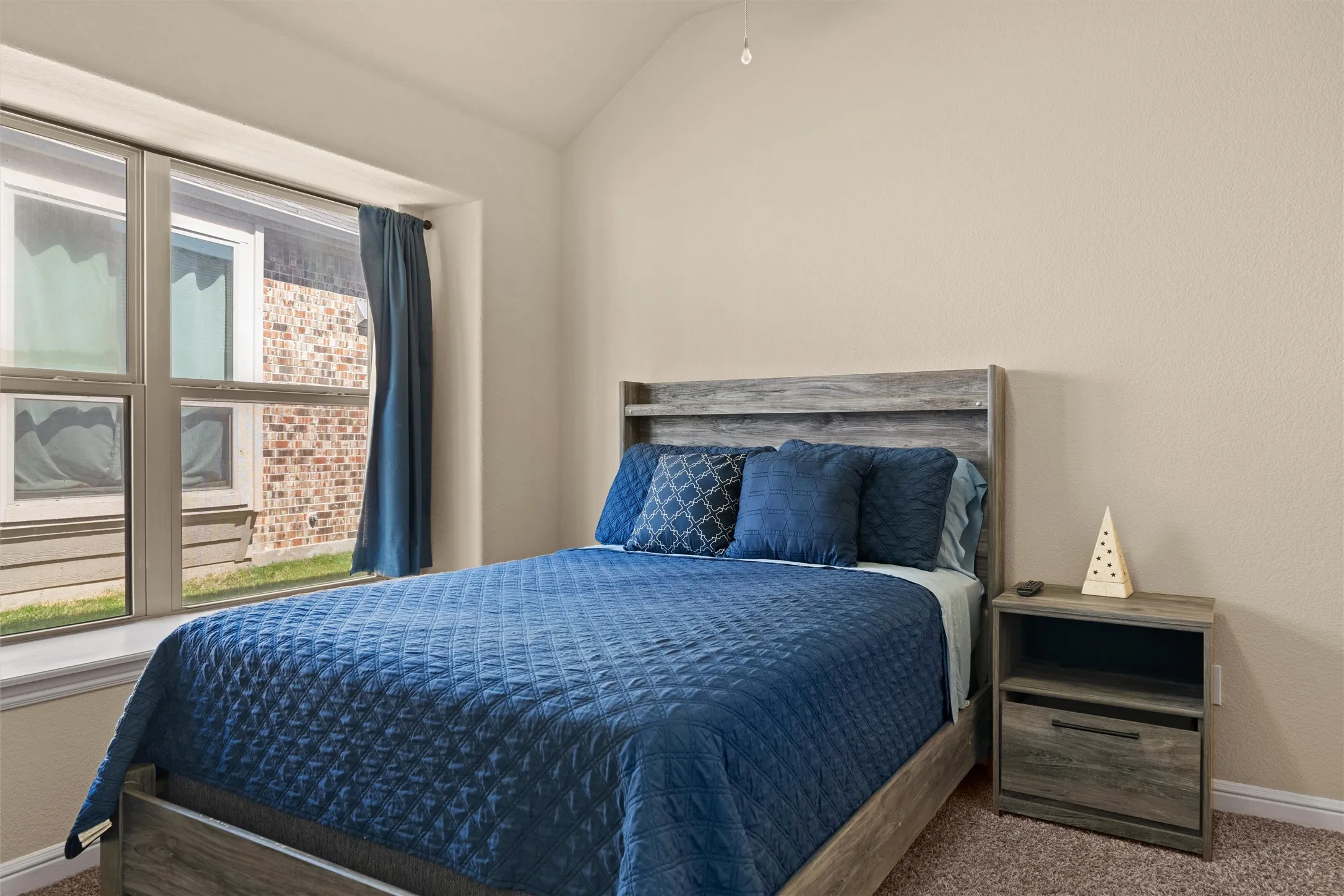One of two secondary bedrooms