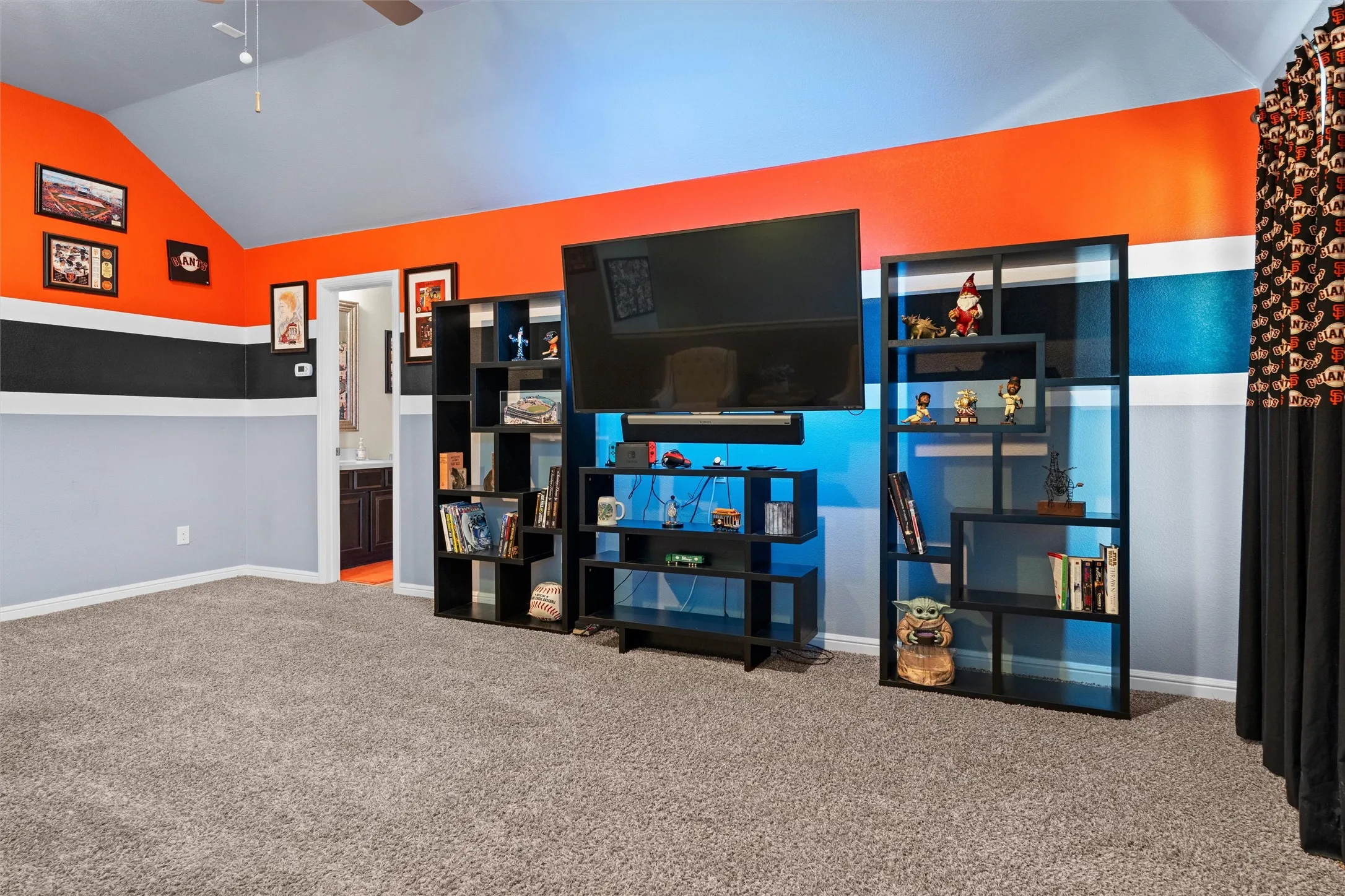 Currently used as a media room, this space is also great for a workout room, craft-sewing room or a fourth bedroom