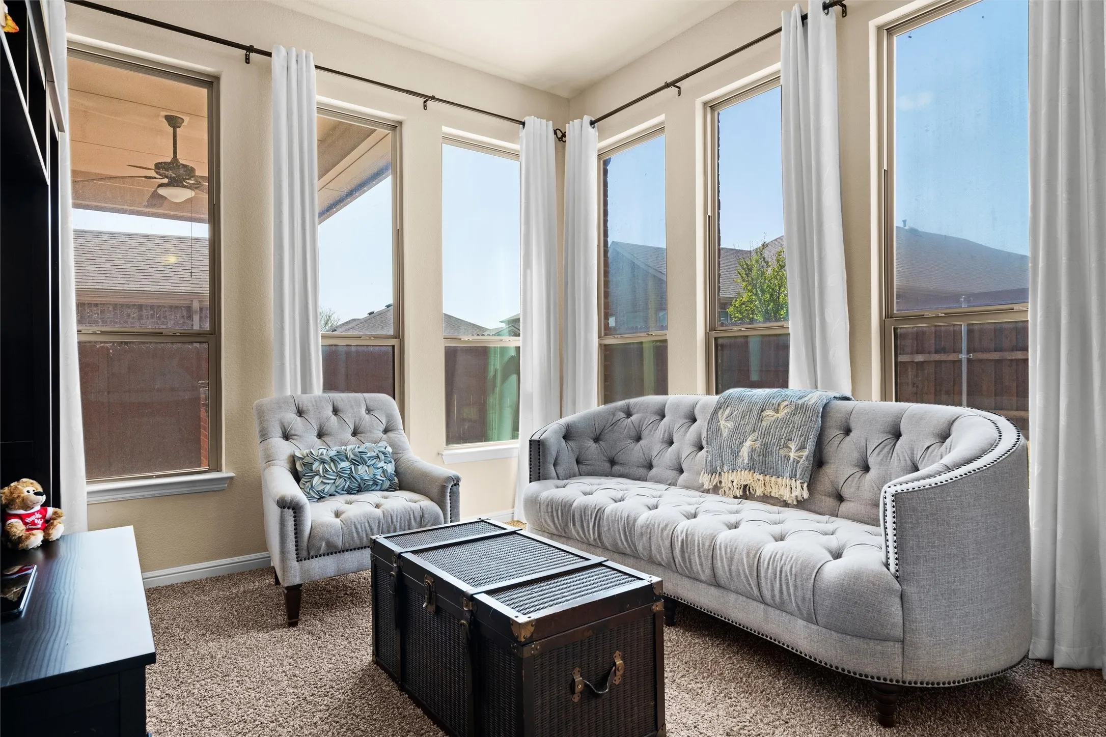 Private sitting area off the primary suite—ideal for a home office, reading nook, nursery, or workout space.