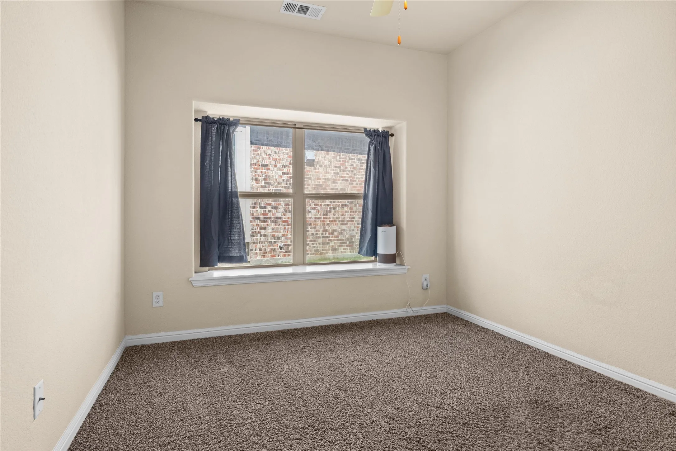 One of two secondary bedrooms
