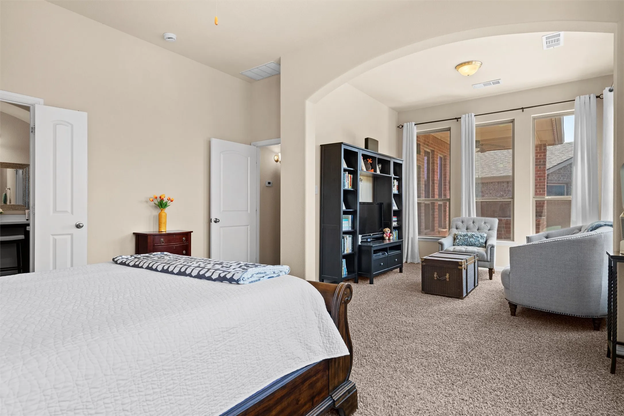 Spacious primary bedroom is your private retreat!