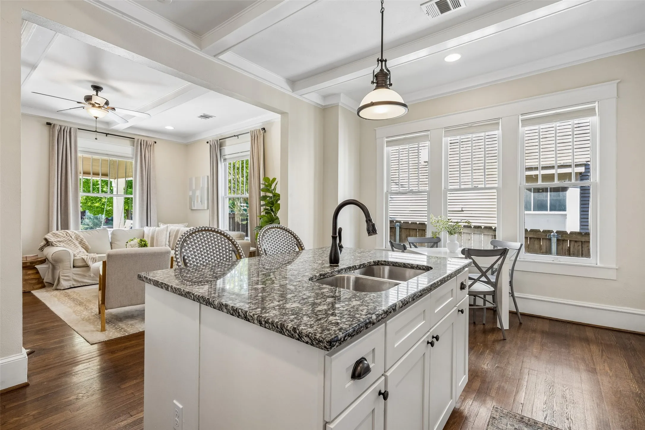 Separated, yet open to living spaces....fantastic for entertaining. Truly the heart of this home.