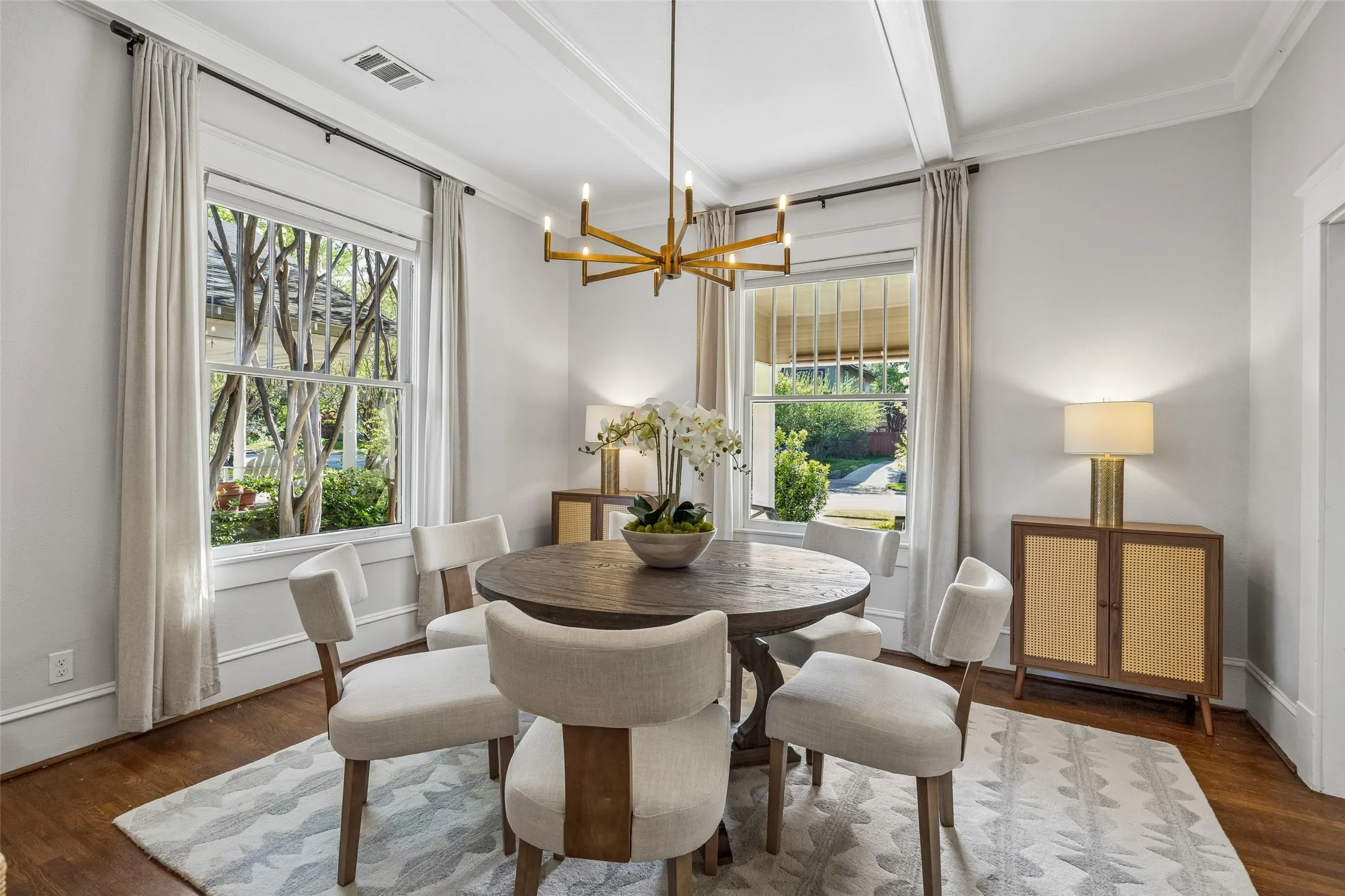 The dining room is generously sized for larger tables and traditional furnishings.