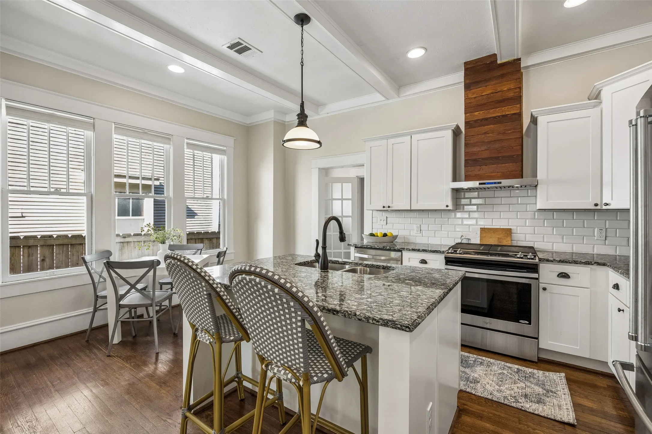 Even ample space for table and chairs as well as counter top dining.