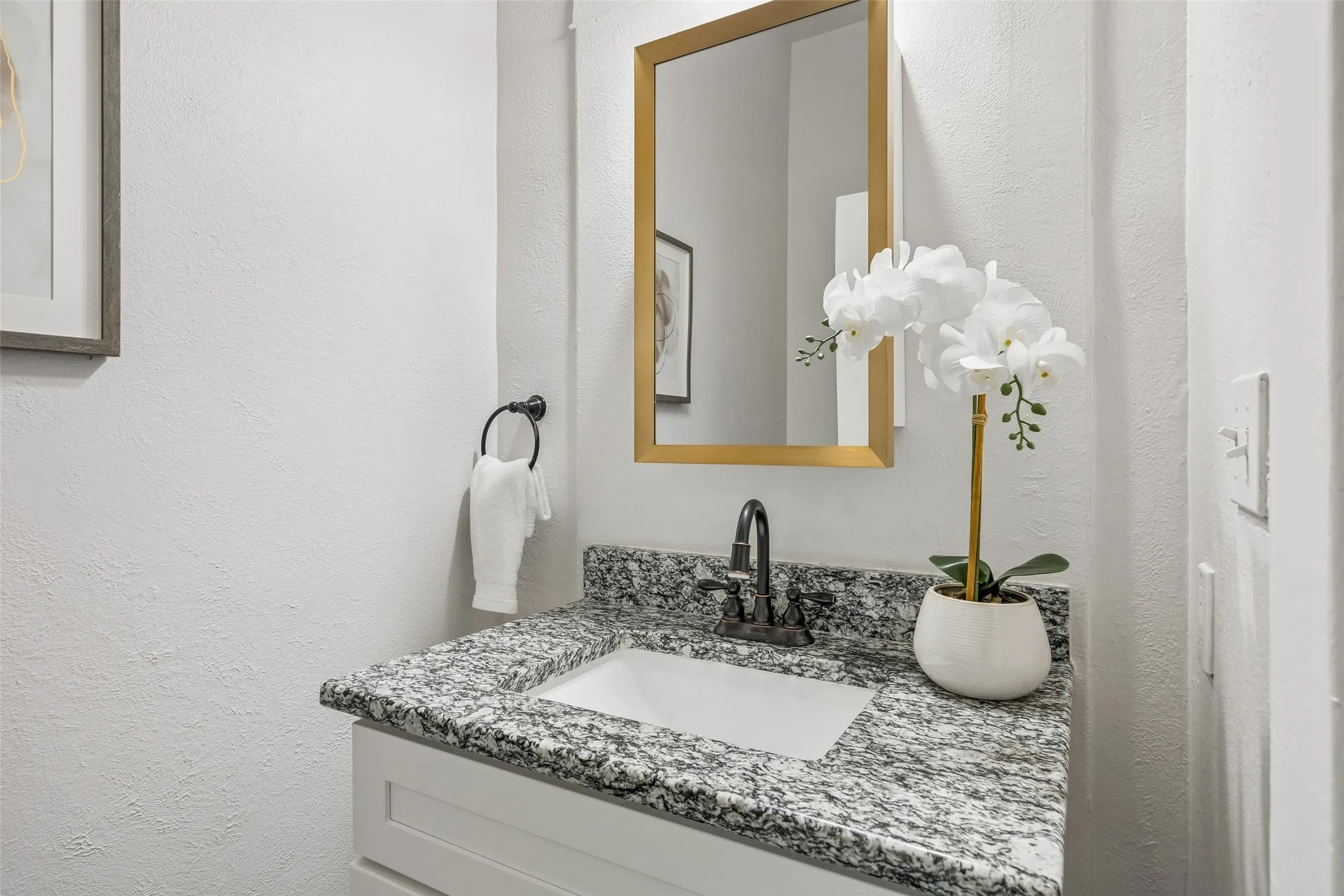 So rare and hard to find in a vintage home is a nicely sized powder bath.