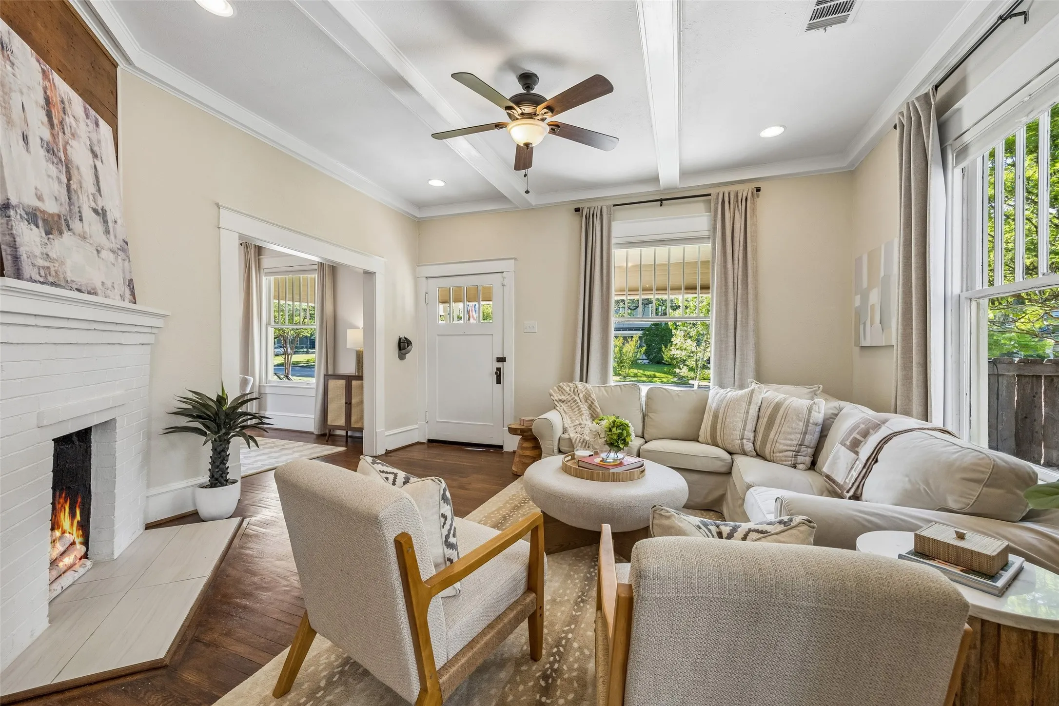 Charming and original, oversized windows still retain their highly desirable wavy glass. Great ventilation and glorious natural light!