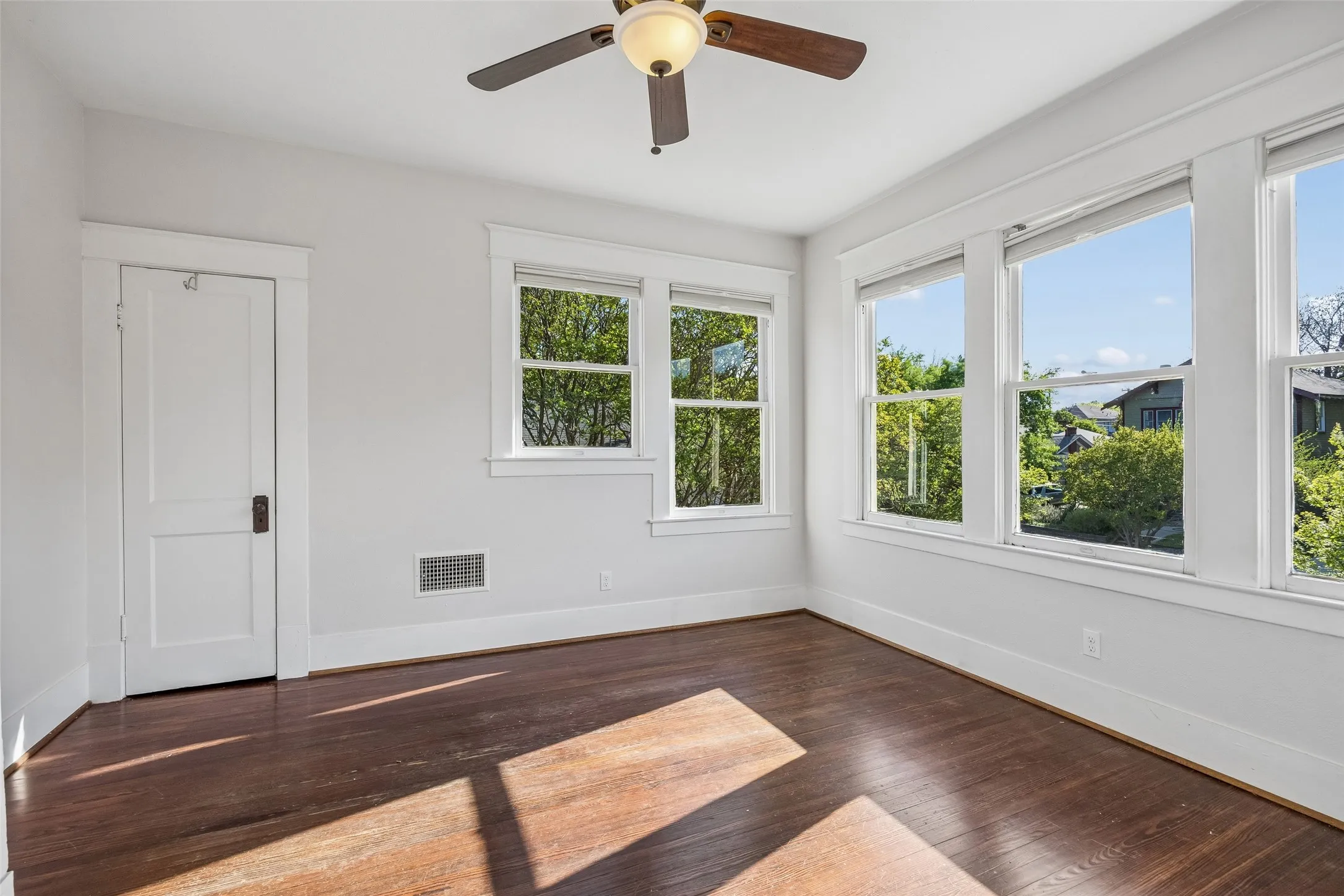 The second story offers two generously sized bedrooms filled with light.