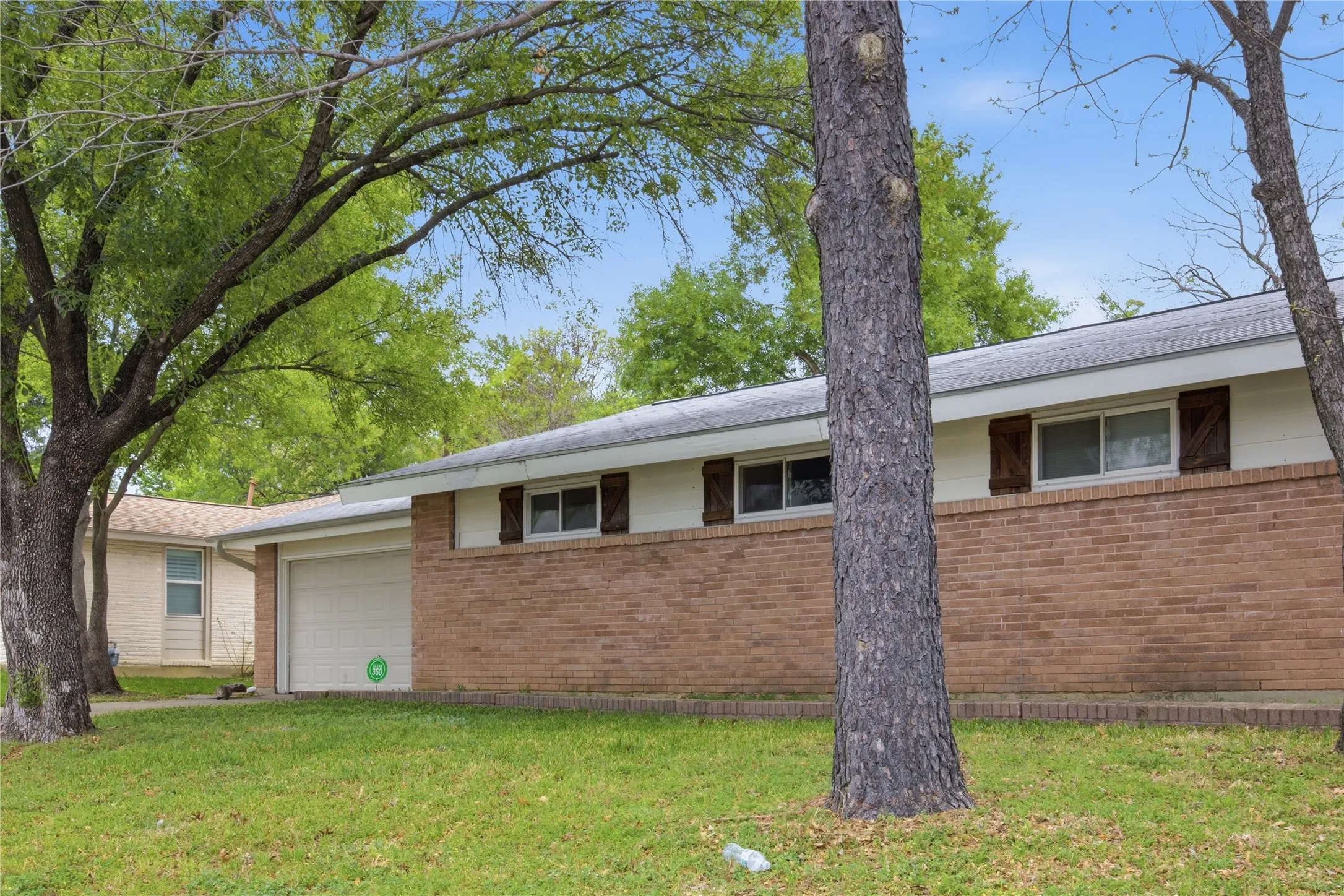 Mature trees and ranch style home!
