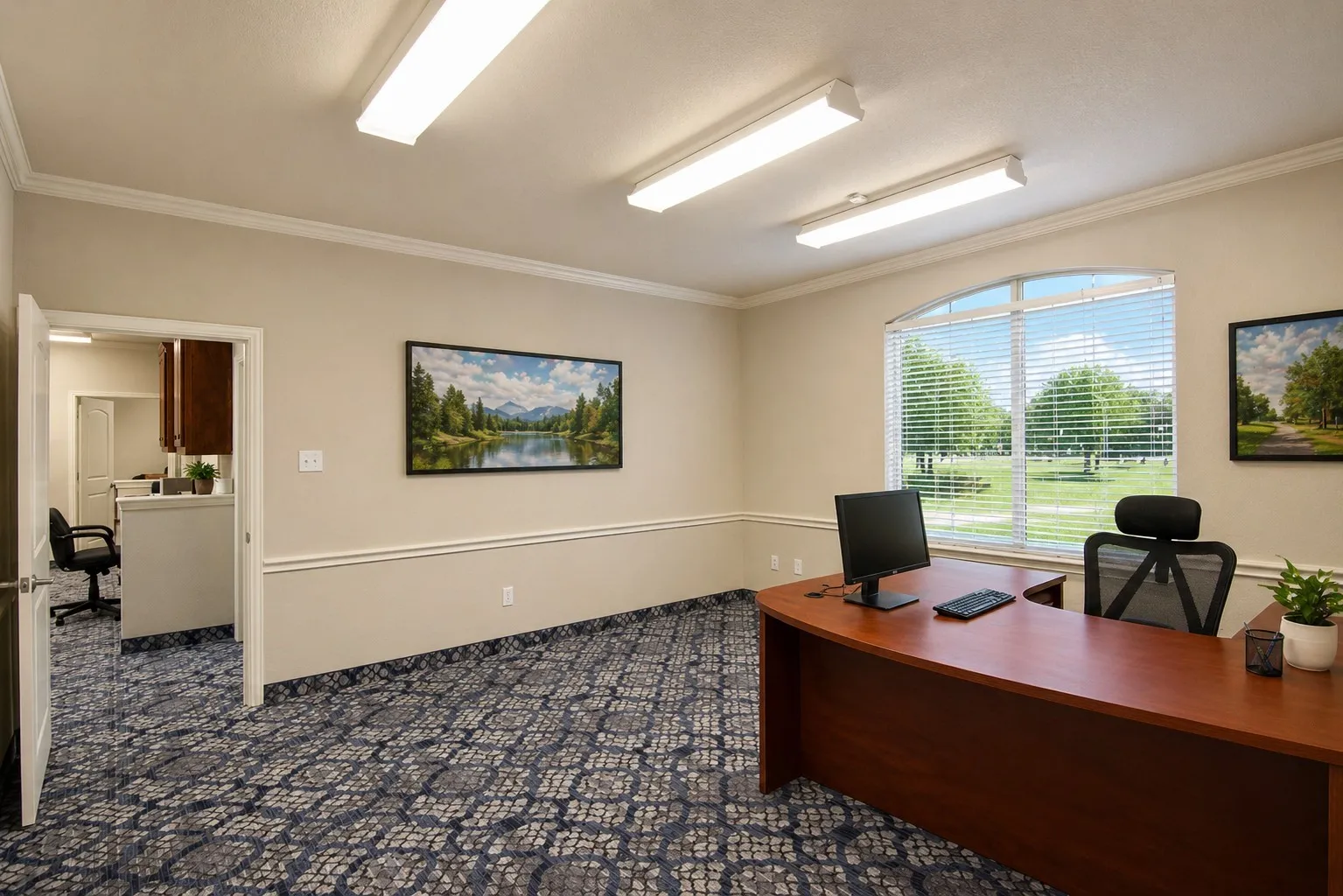 Commercial office space featuring patterned carpeting and crown molding