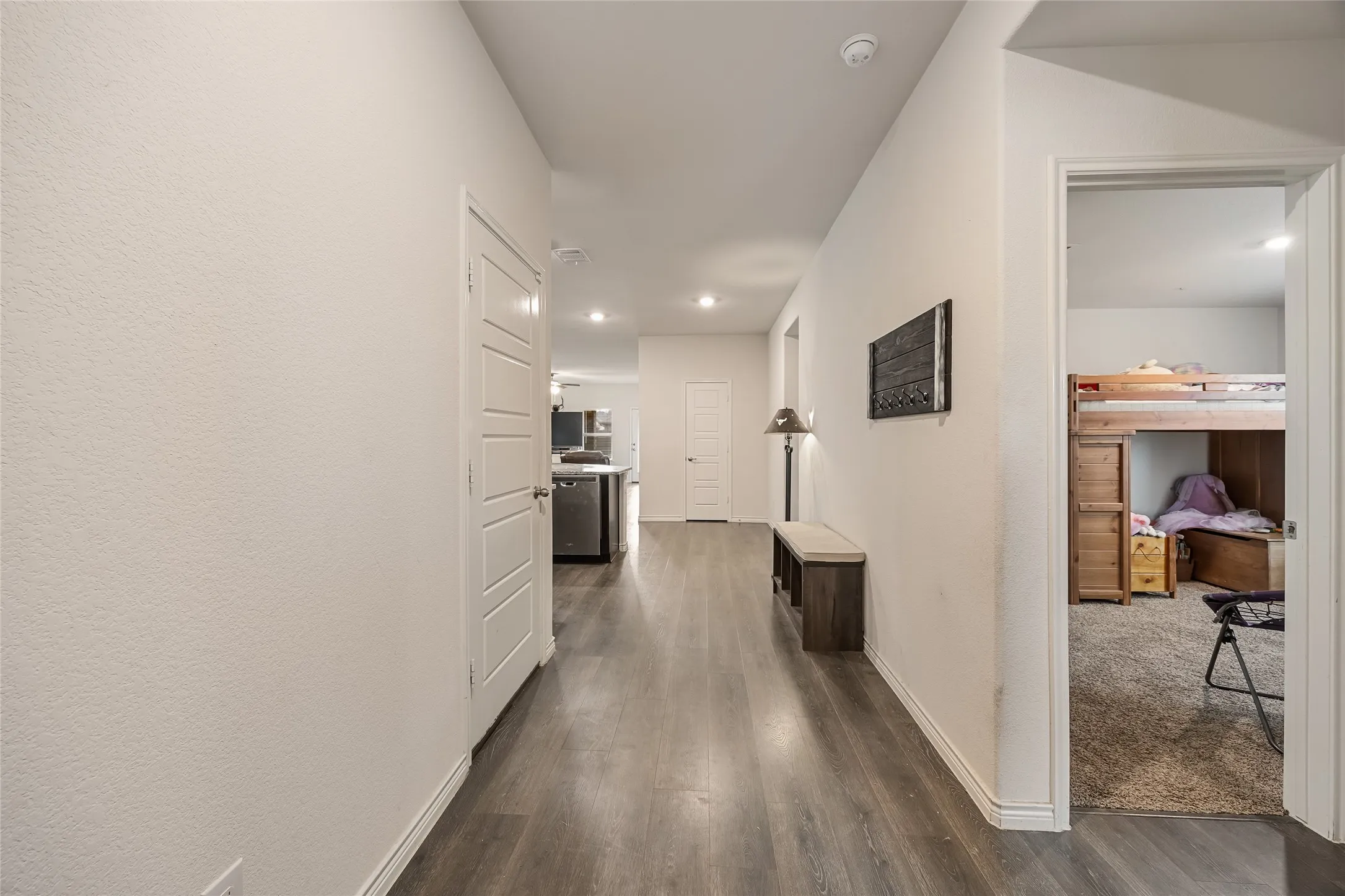 Entryway. All secondary bedrooms are located in the front of the home.