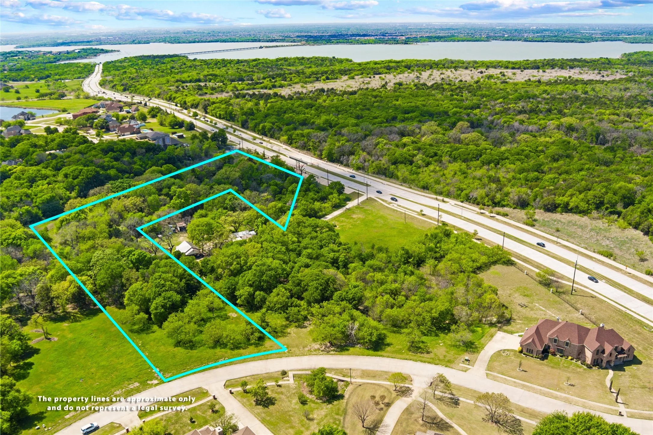 Property Shot with view of Lake & Mansfield Rd