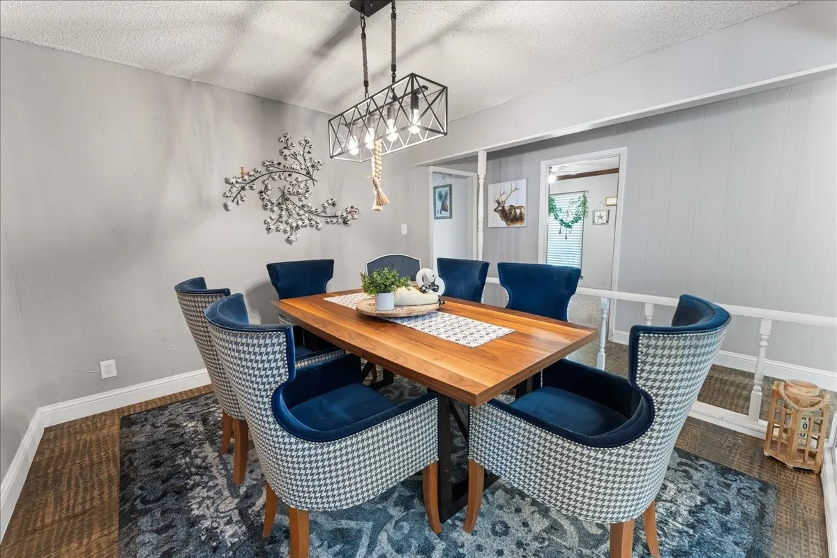 Dining space featuring a textured ceiling
