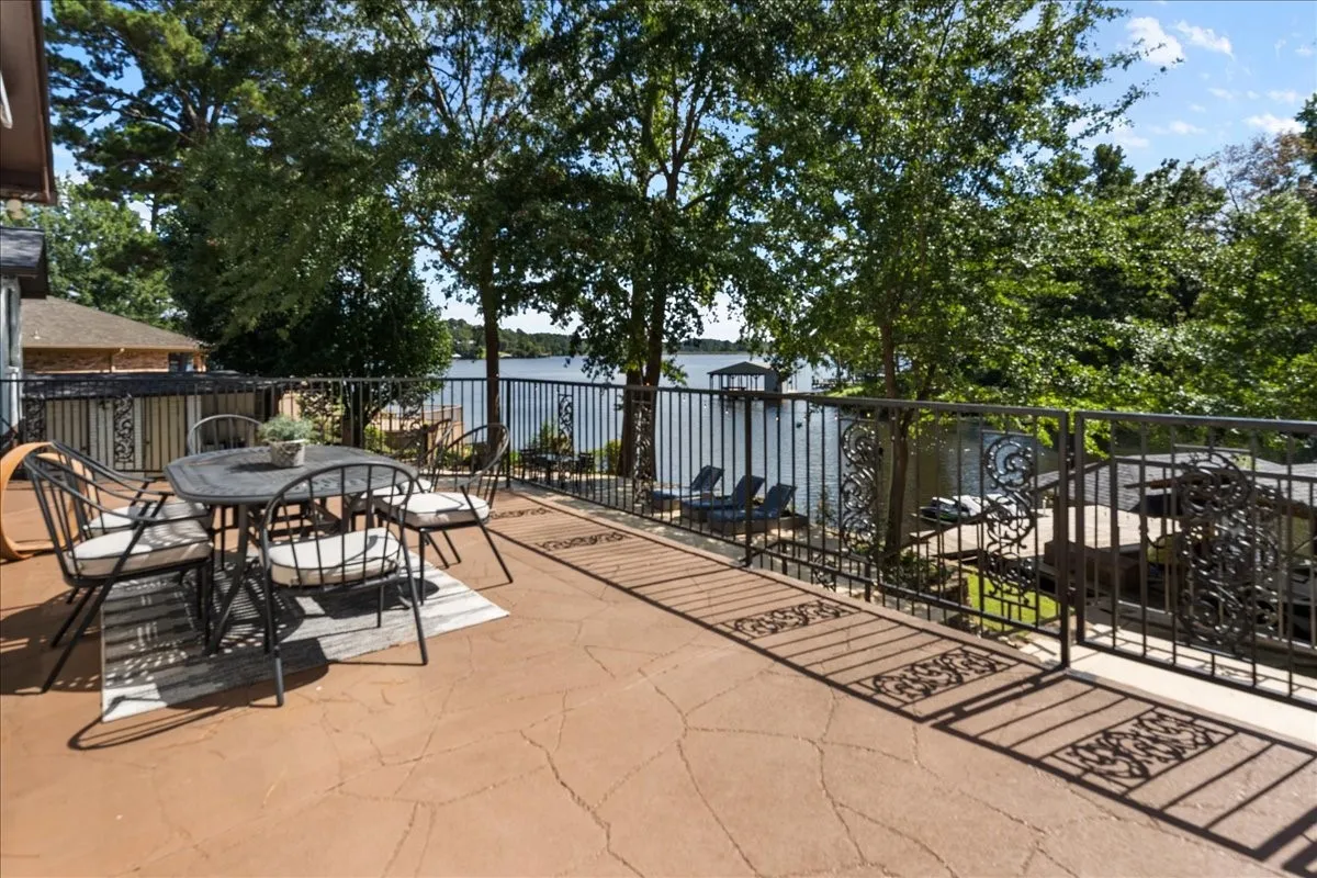 View of patio / terrace with outdoor dining space and a water view