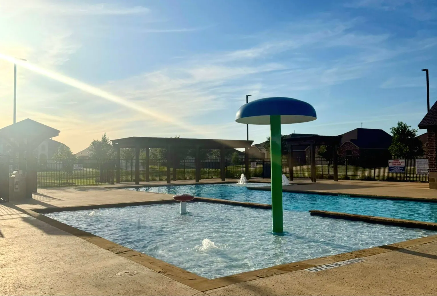 Community pool with fountain, shallow play area, pergolas, BBQ's, and more.