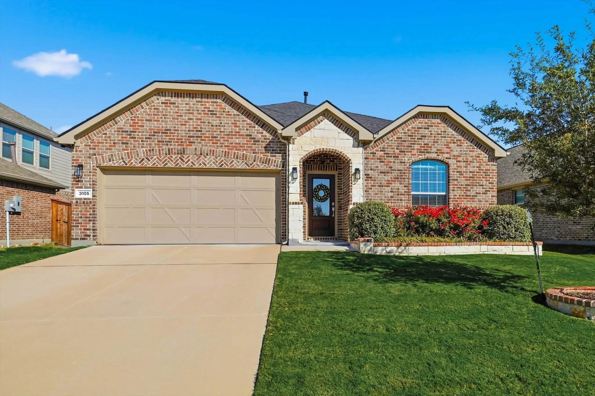 Single story, updated home with a spacious two-car garage and updated landscaping.