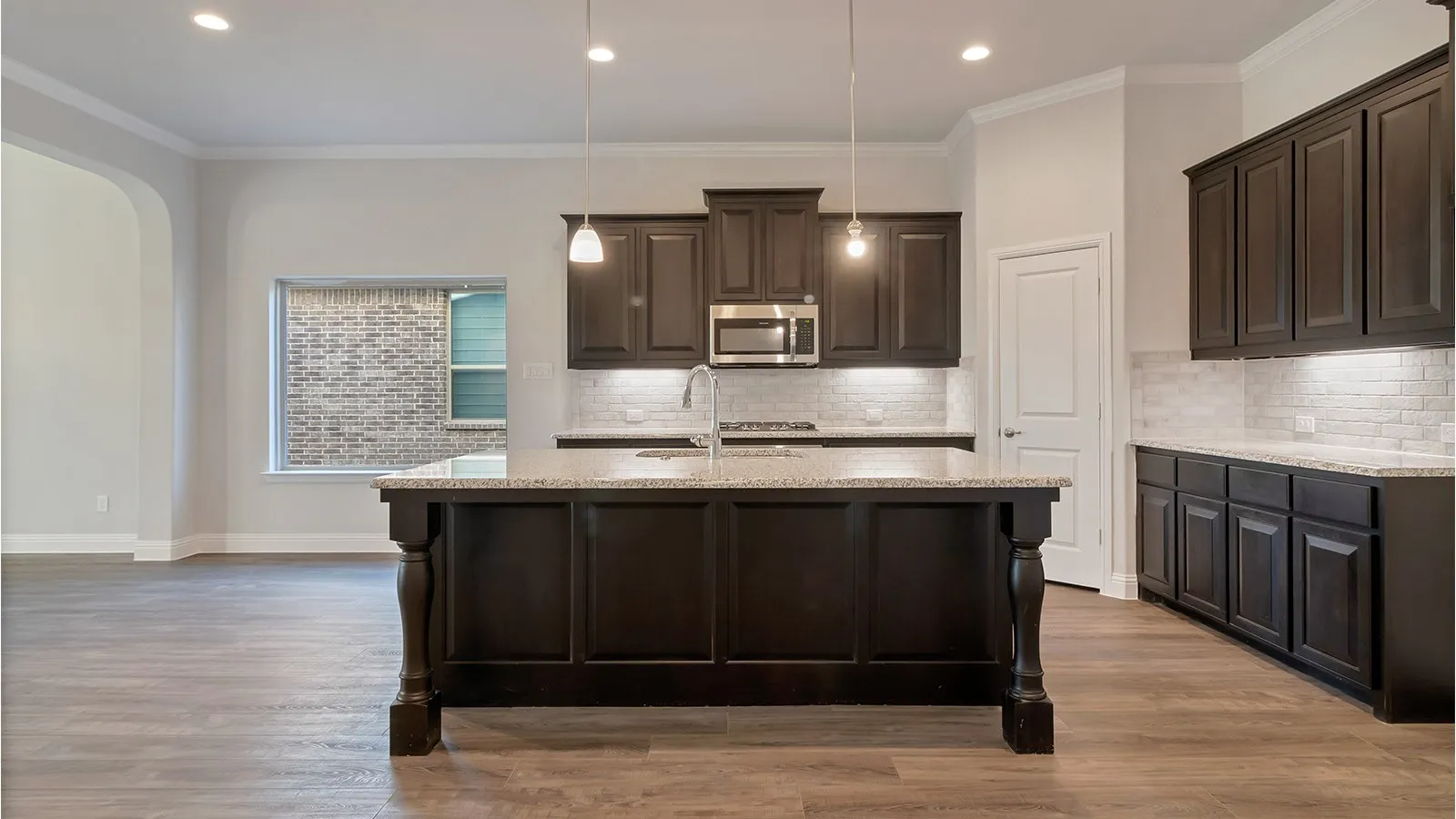 Kitchen - All Home and community information, including pricing, included features, terms, availability and amenities, are subject to change at any time without notice or obligation. All Drawings, pictures, photographs, video, square footages, floor plans, elevations, features, colors and sizes are approximate for illustration purposes only and will vary from the homes as built.
