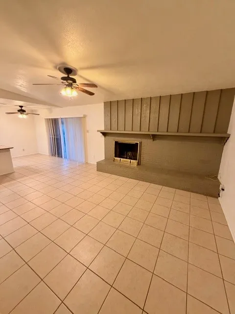 Beautiful painted brick fireplace in the living room!