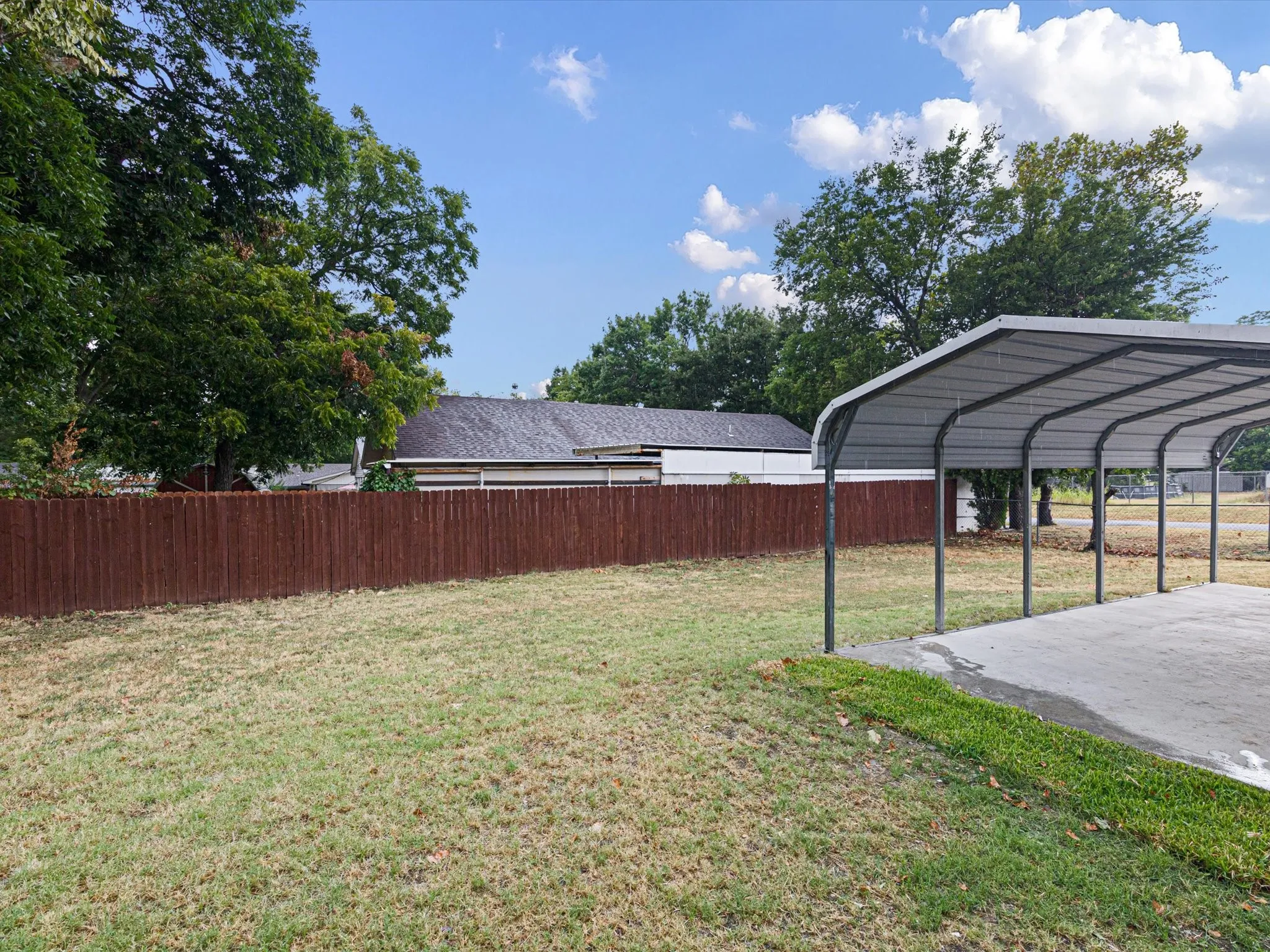 Spacious backyard on a corner lot over 1/3 of an acre.