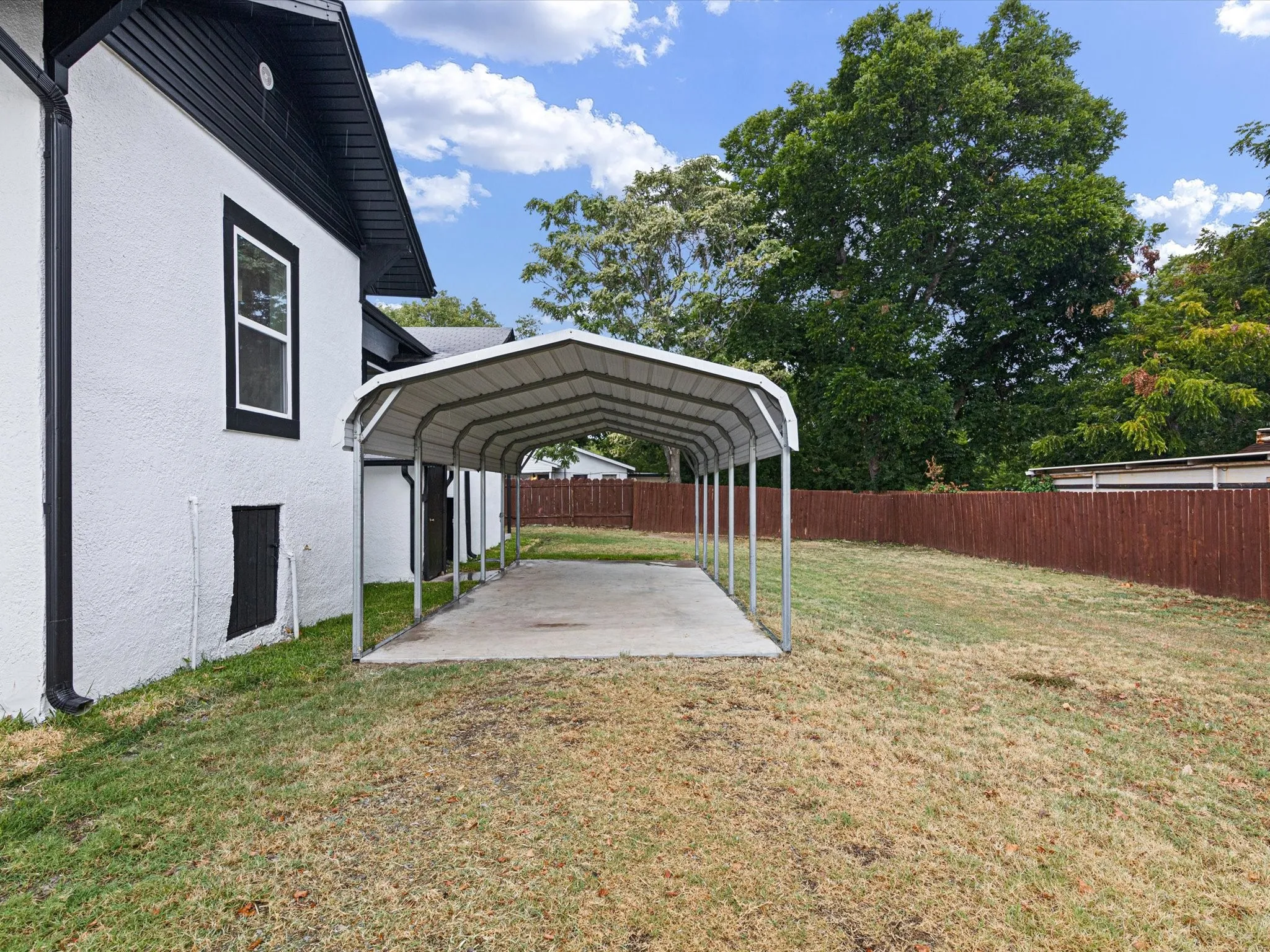 Another view of 3rd covered car port.