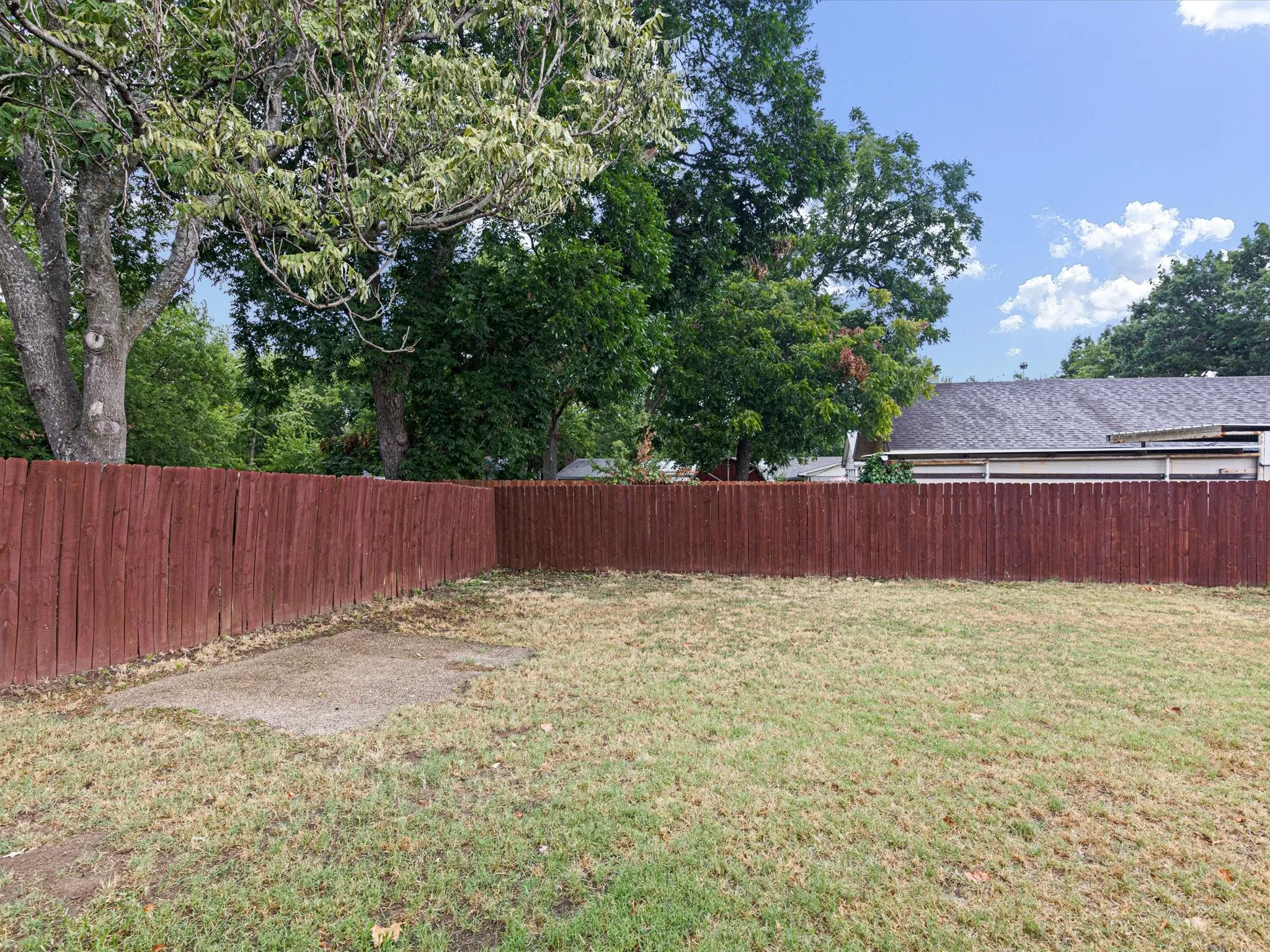Spacious backyard on a corner lot over 1/3 of an acre.